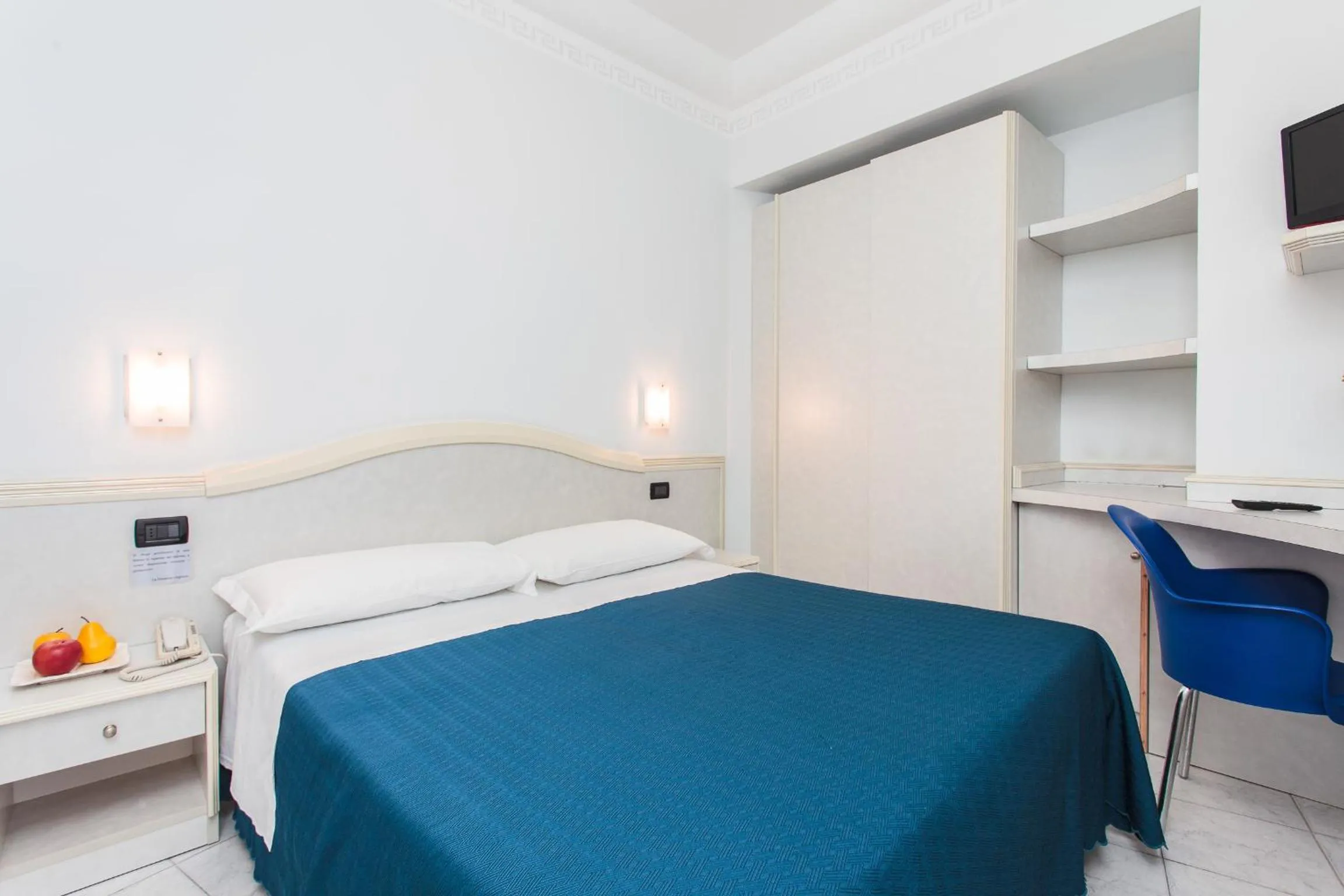 Bed in Hotel Oriente
