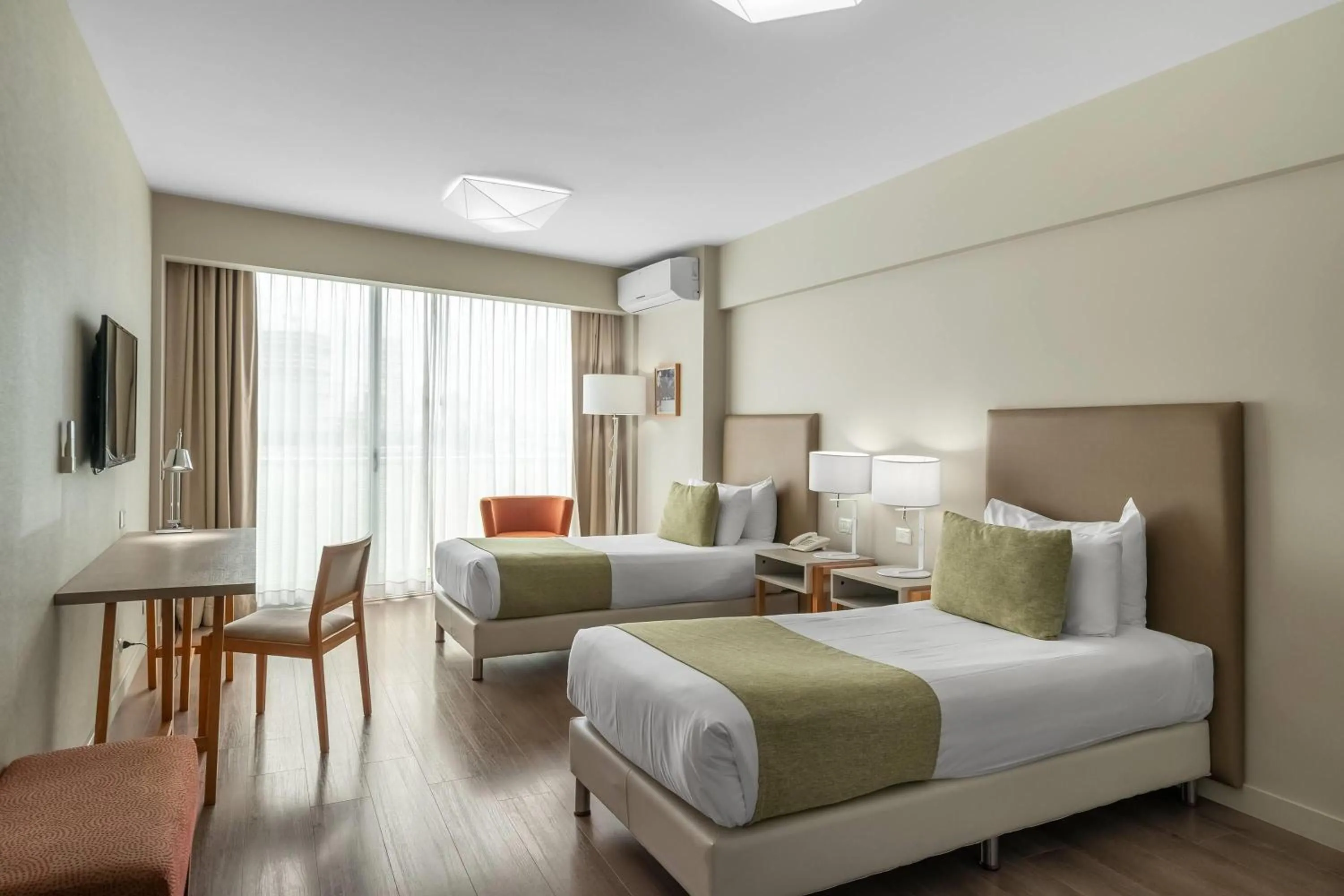 Photo of the whole room, Bed in Dazzler by Wyndham Polo