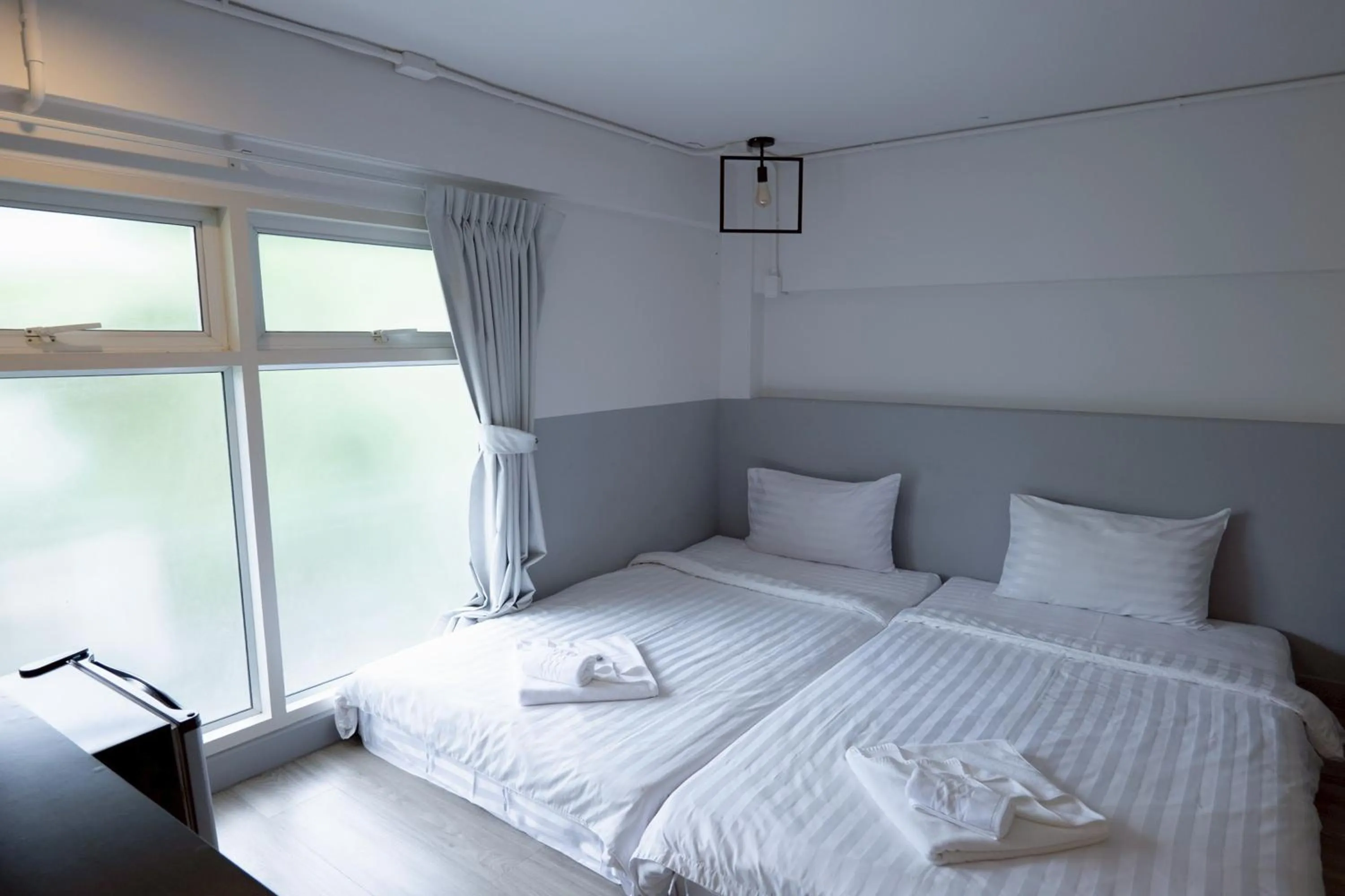 Photo of the whole room, Bed in Surachet at 257 Boutique House