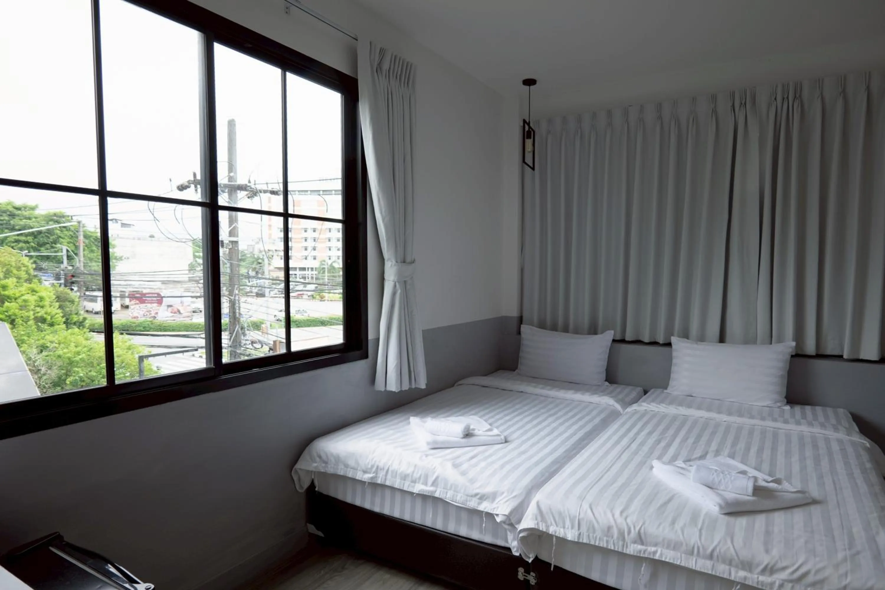 Photo of the whole room, Bed in Surachet at 257 Boutique House