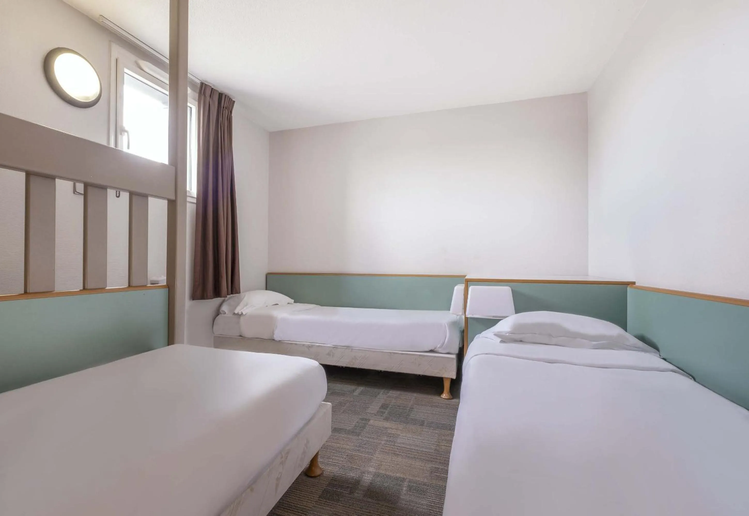 Bedroom, Bed in B&B HOTEL La Rochelle Centre