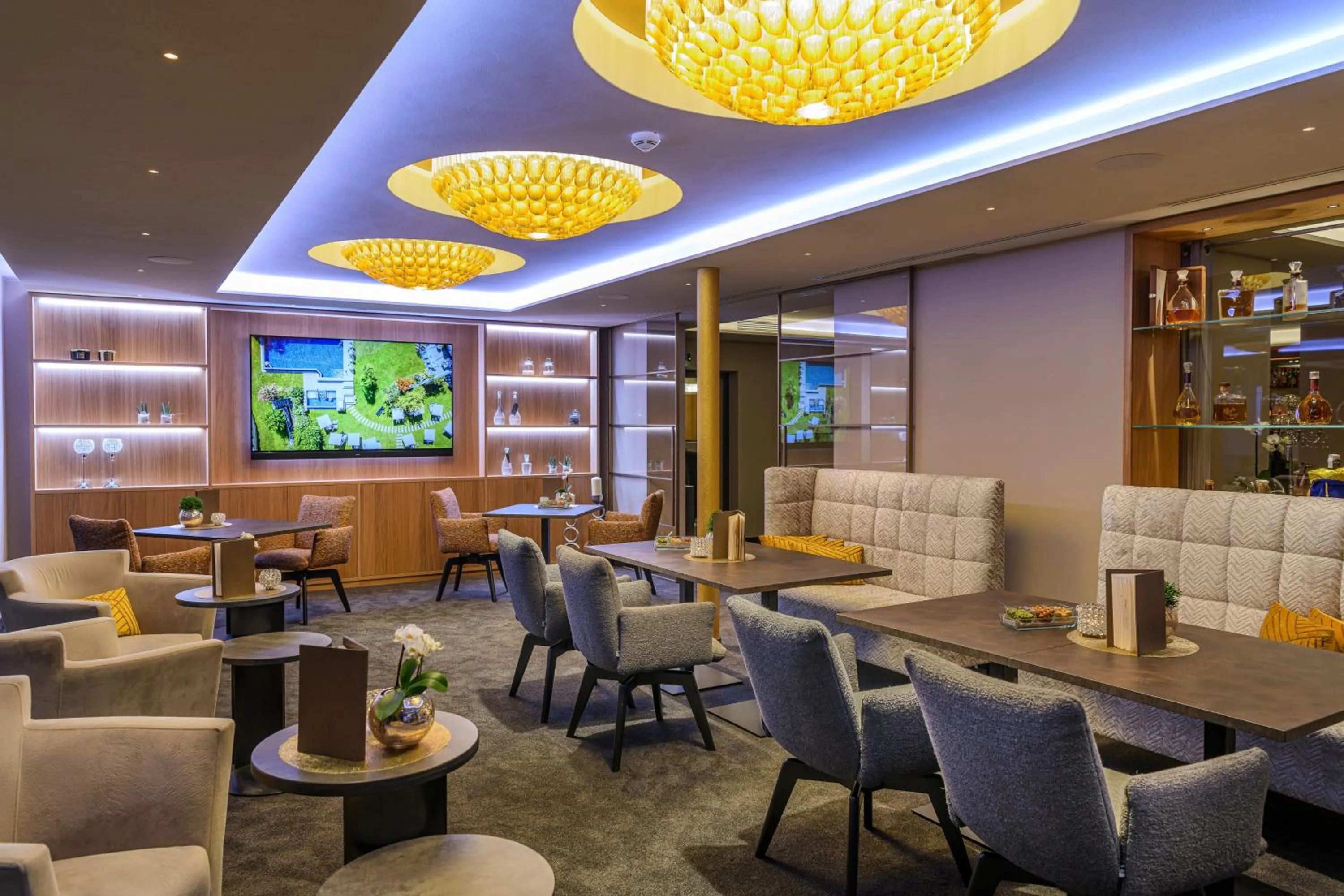 Communal lounge/ TV room in FAYN garden retreat hotel