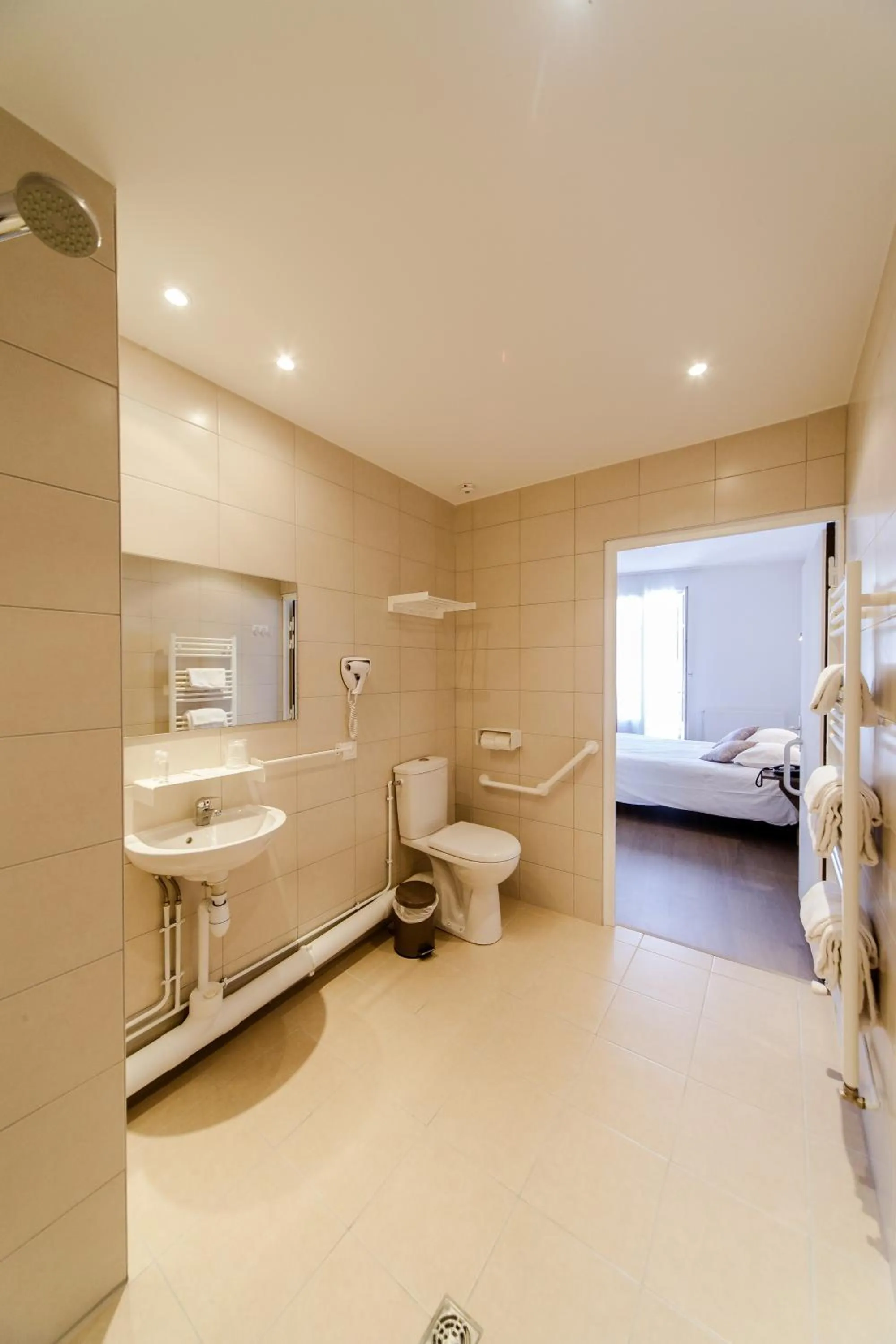 Shower in LOGIS HOTEL - Le Petit Bellon