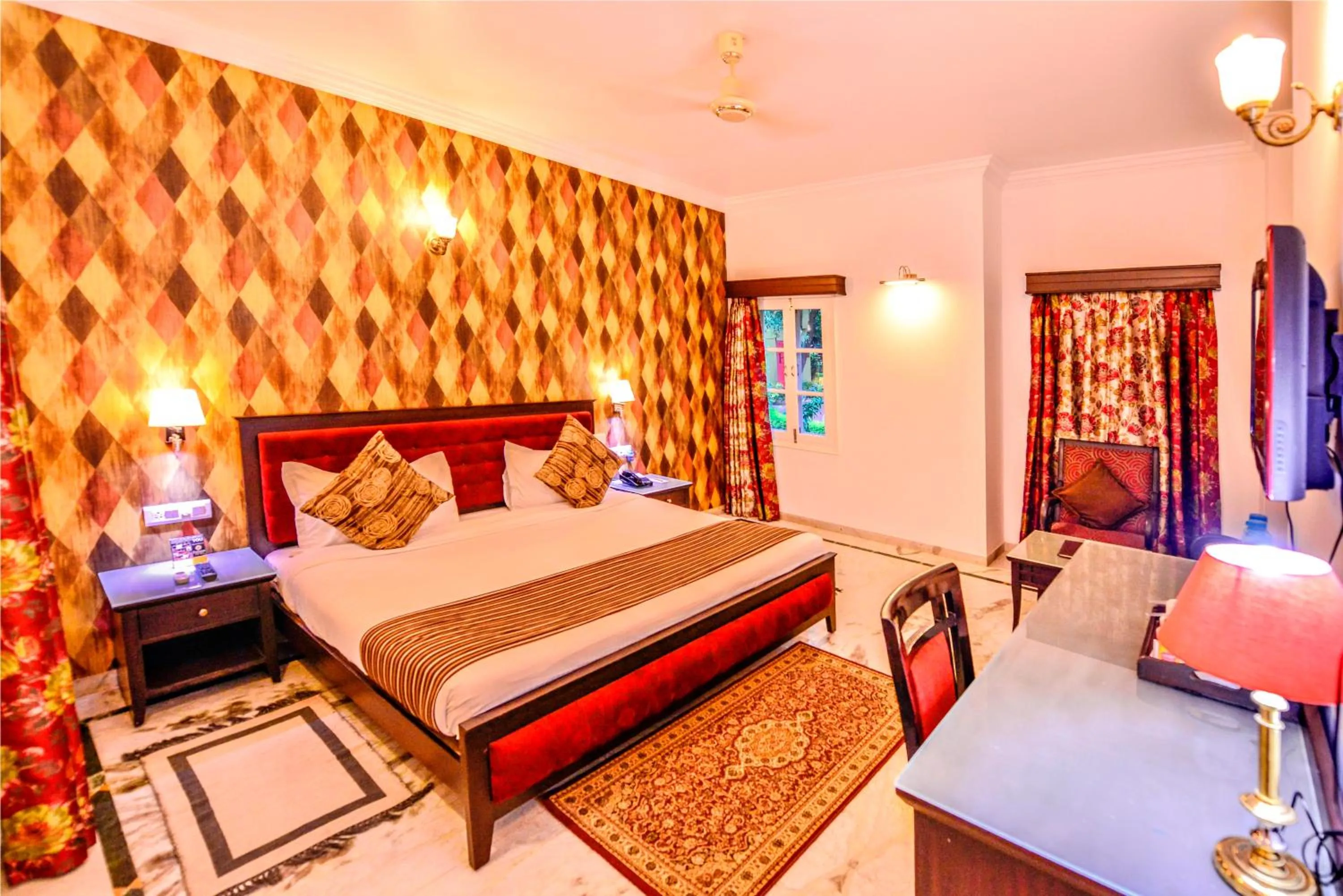 Bed in Amantra Shilpi Resort & Spa Udaipur