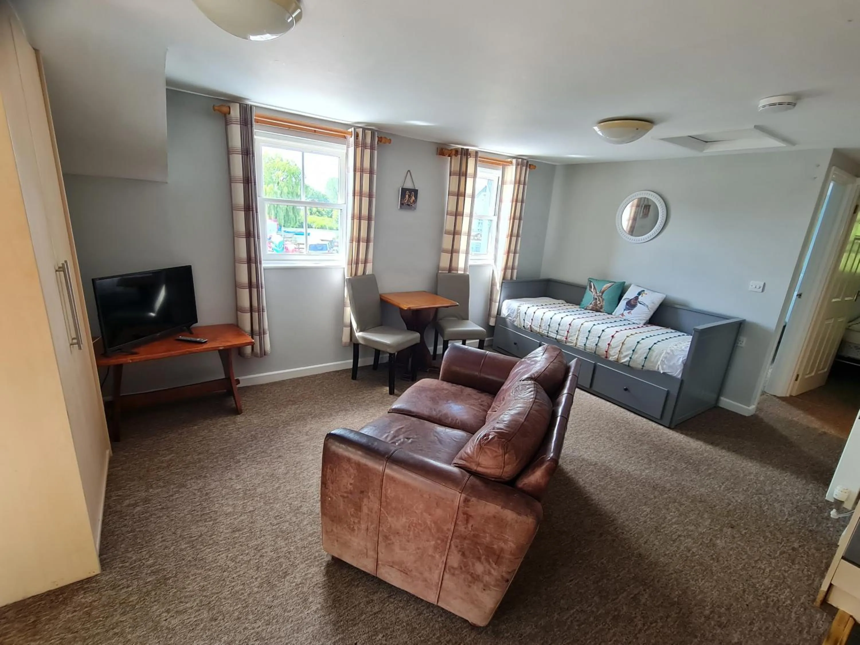 Communal lounge/ TV room in The Riverside