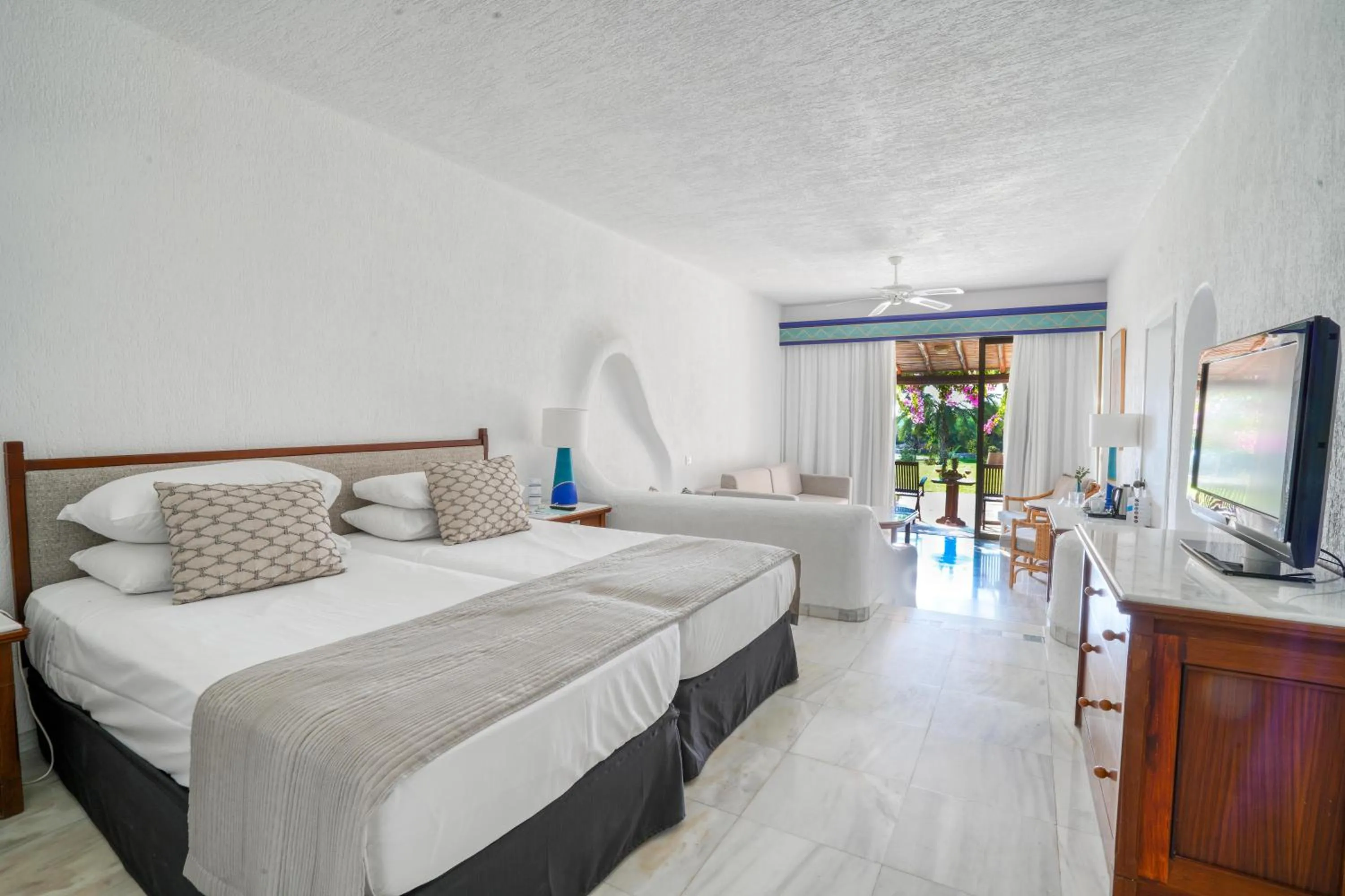 Photo of the whole room, Bed in Coral Beach Hotel & Resort Cyprus