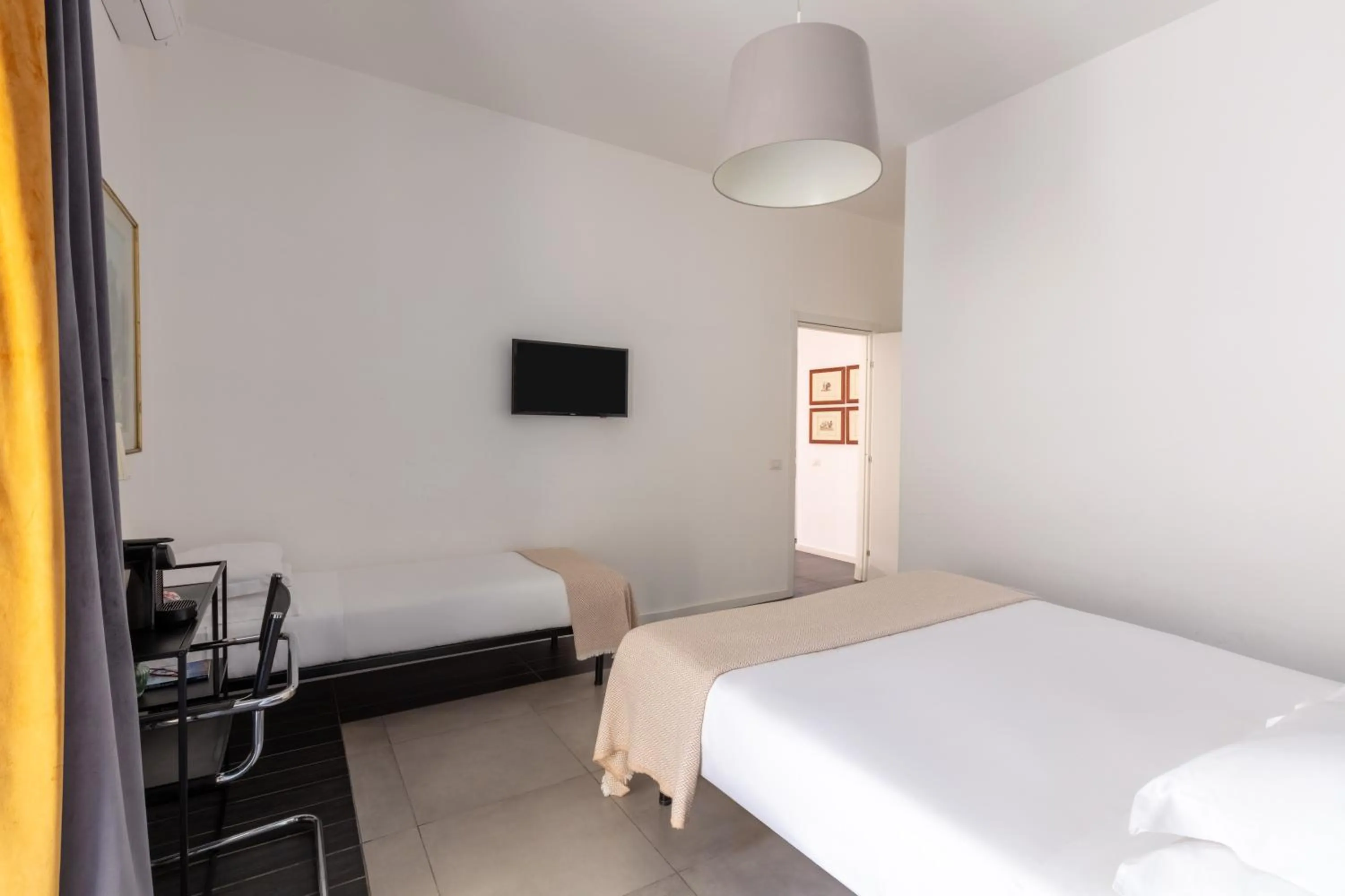 Bed in Vatican City Suites by Hili