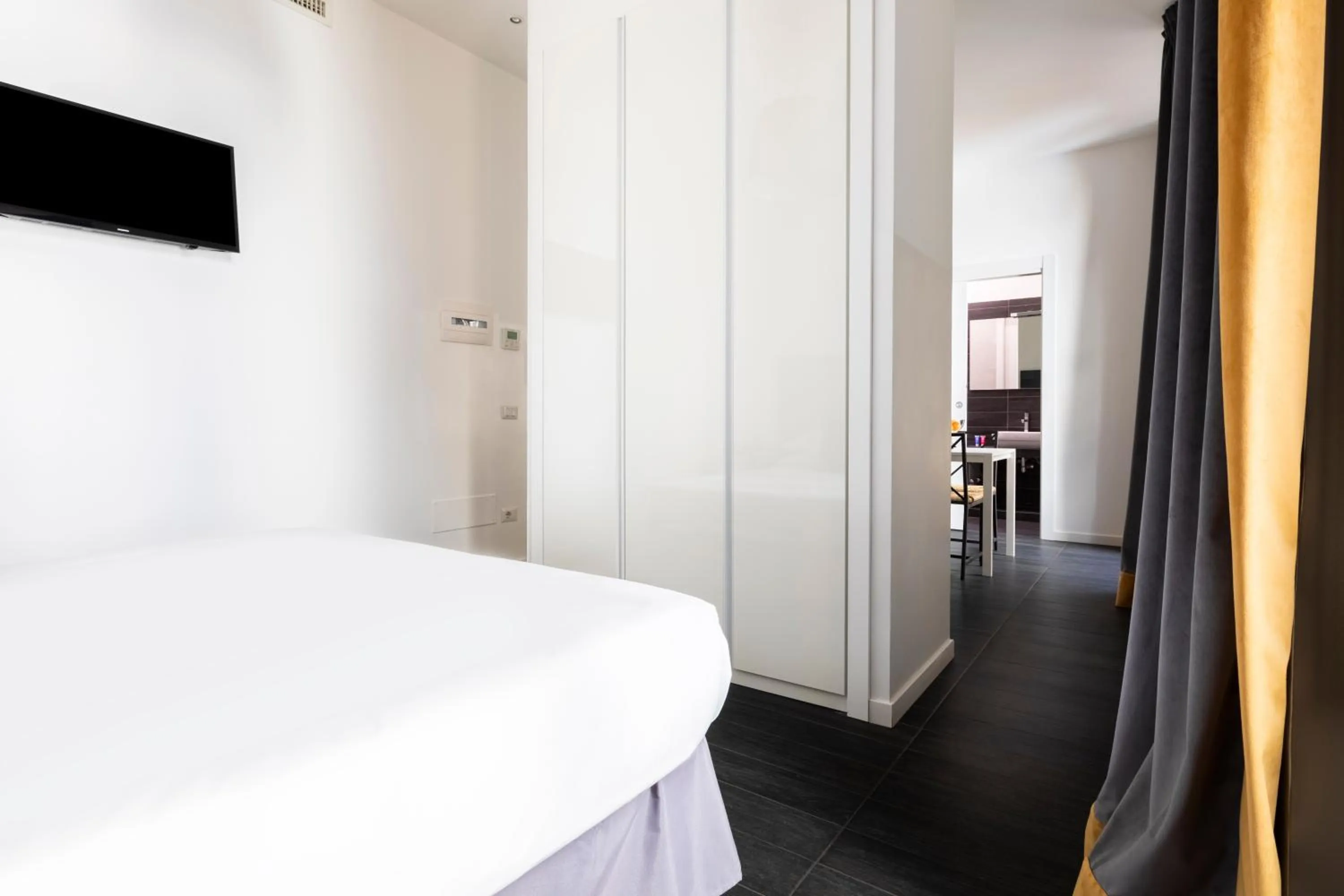 Photo of the whole room, Bed in Vatican City Suites by Hili