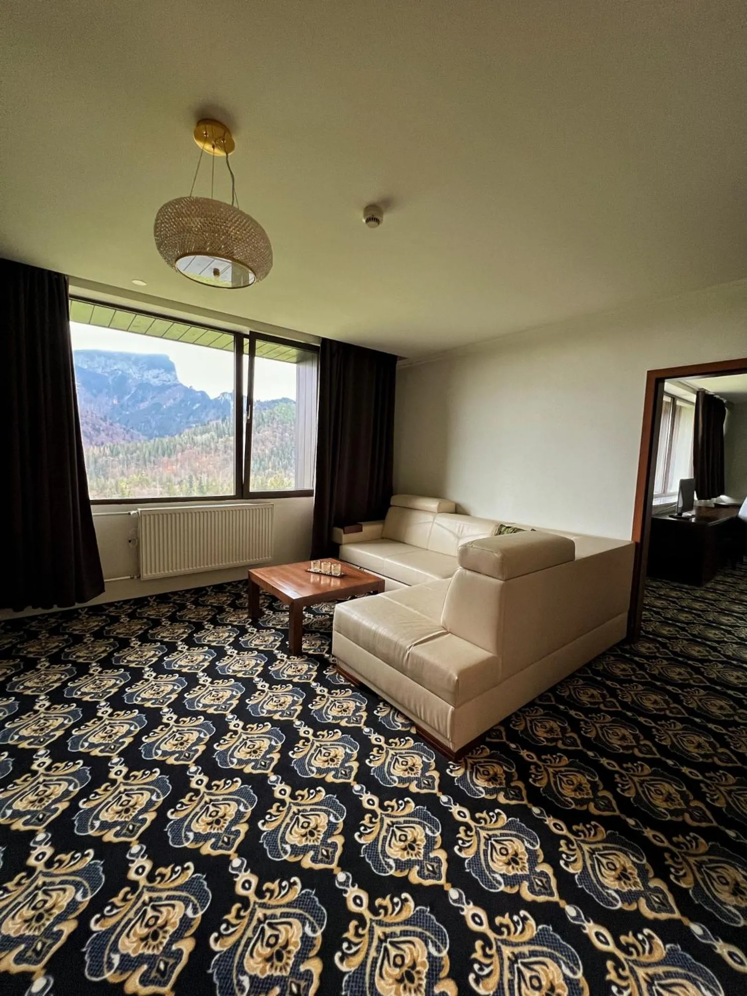 Living room, Bed in President Hotel Montfort