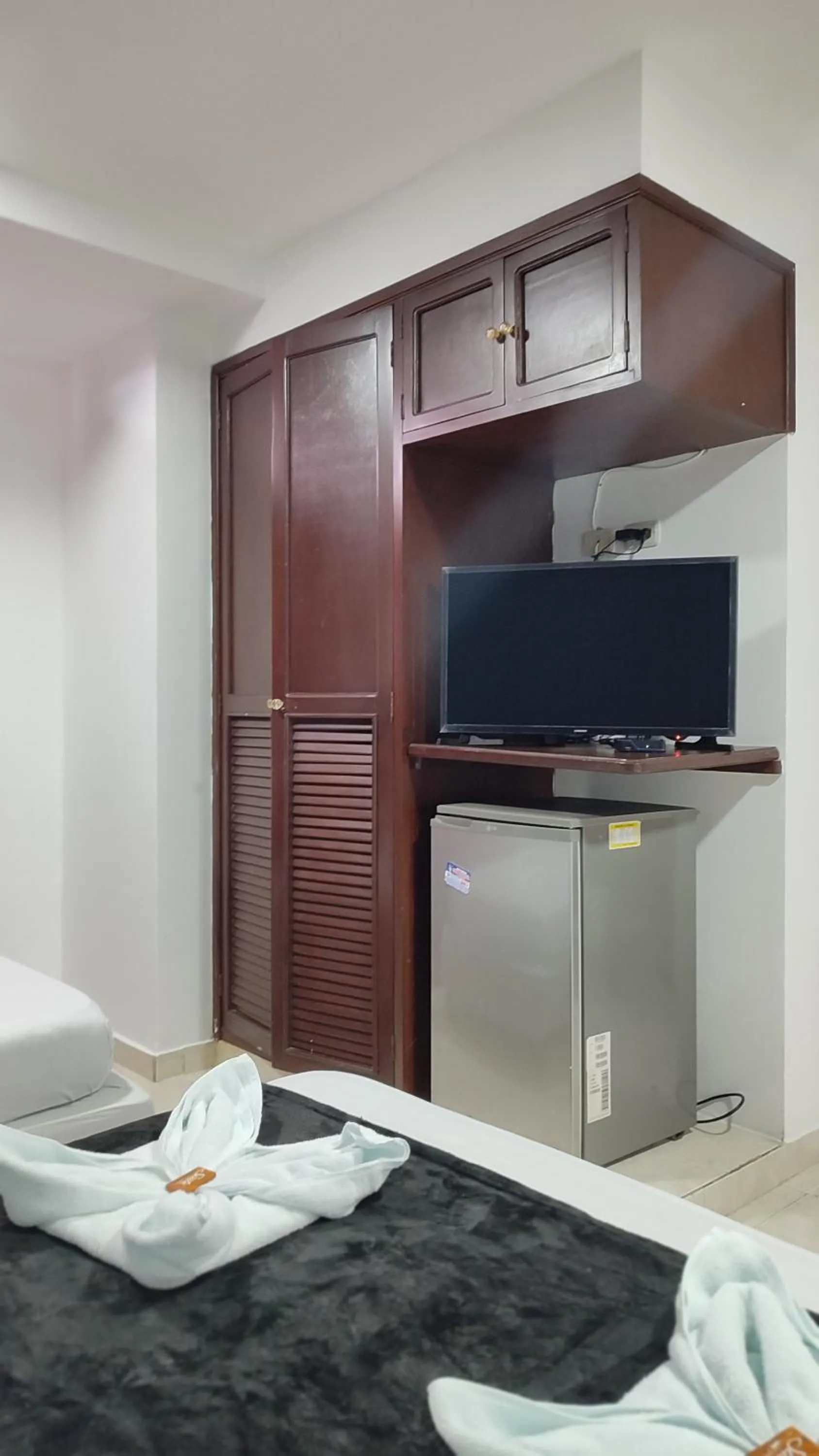 Communal lounge/ TV room in Hotel Dorado BAQ