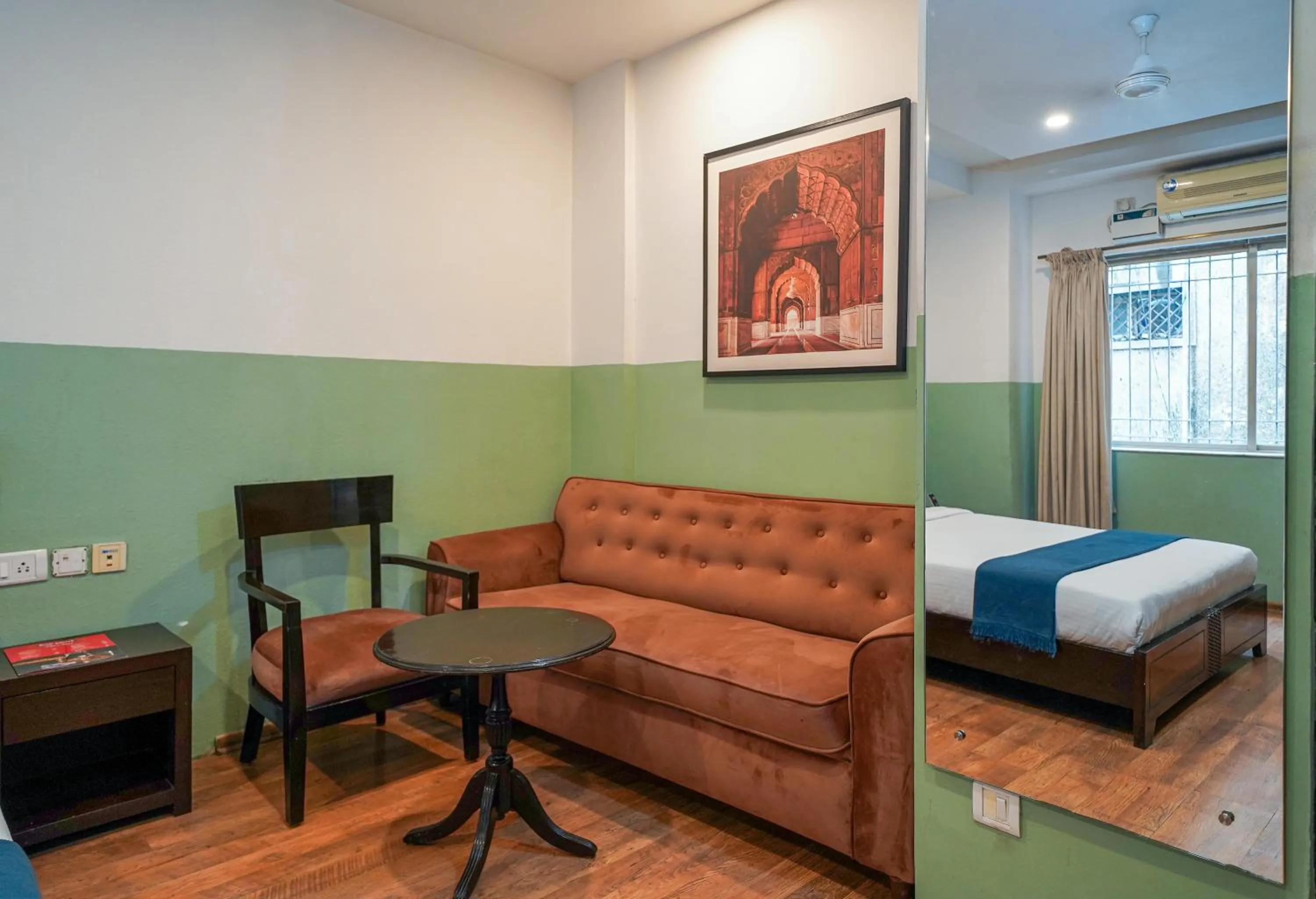 Seating area in Olive Zip Rest House Road by Embassy Group