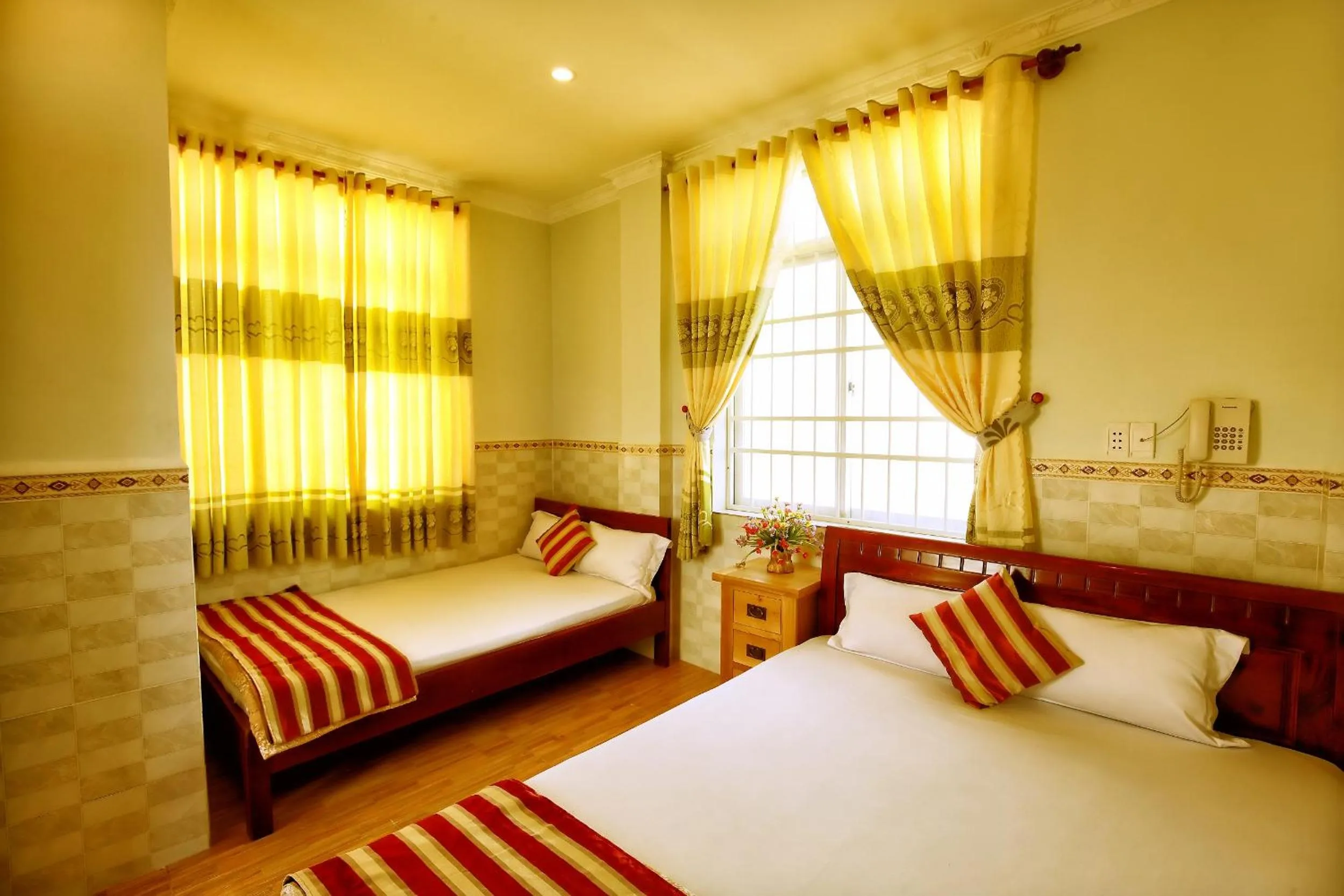 Bed in Hoang Linh Hotel
