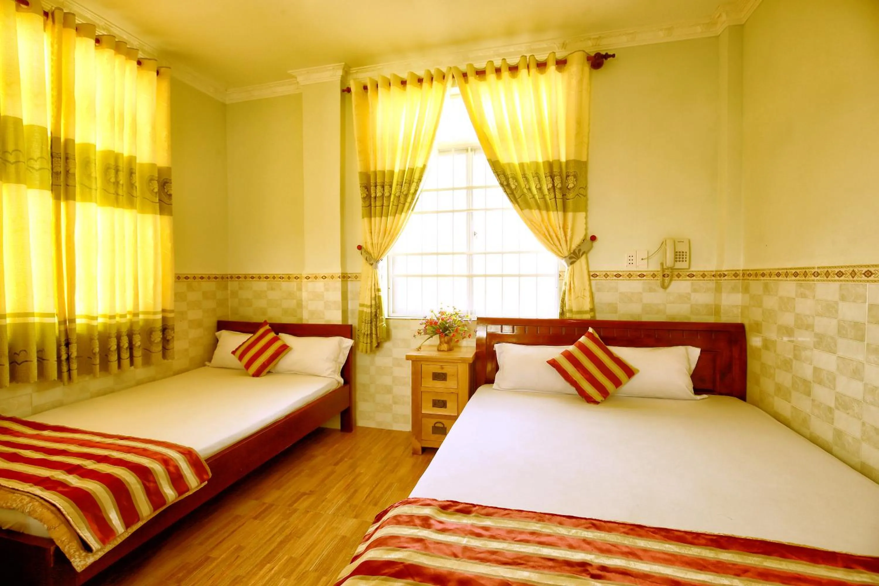 Bed in Hoang Linh Hotel