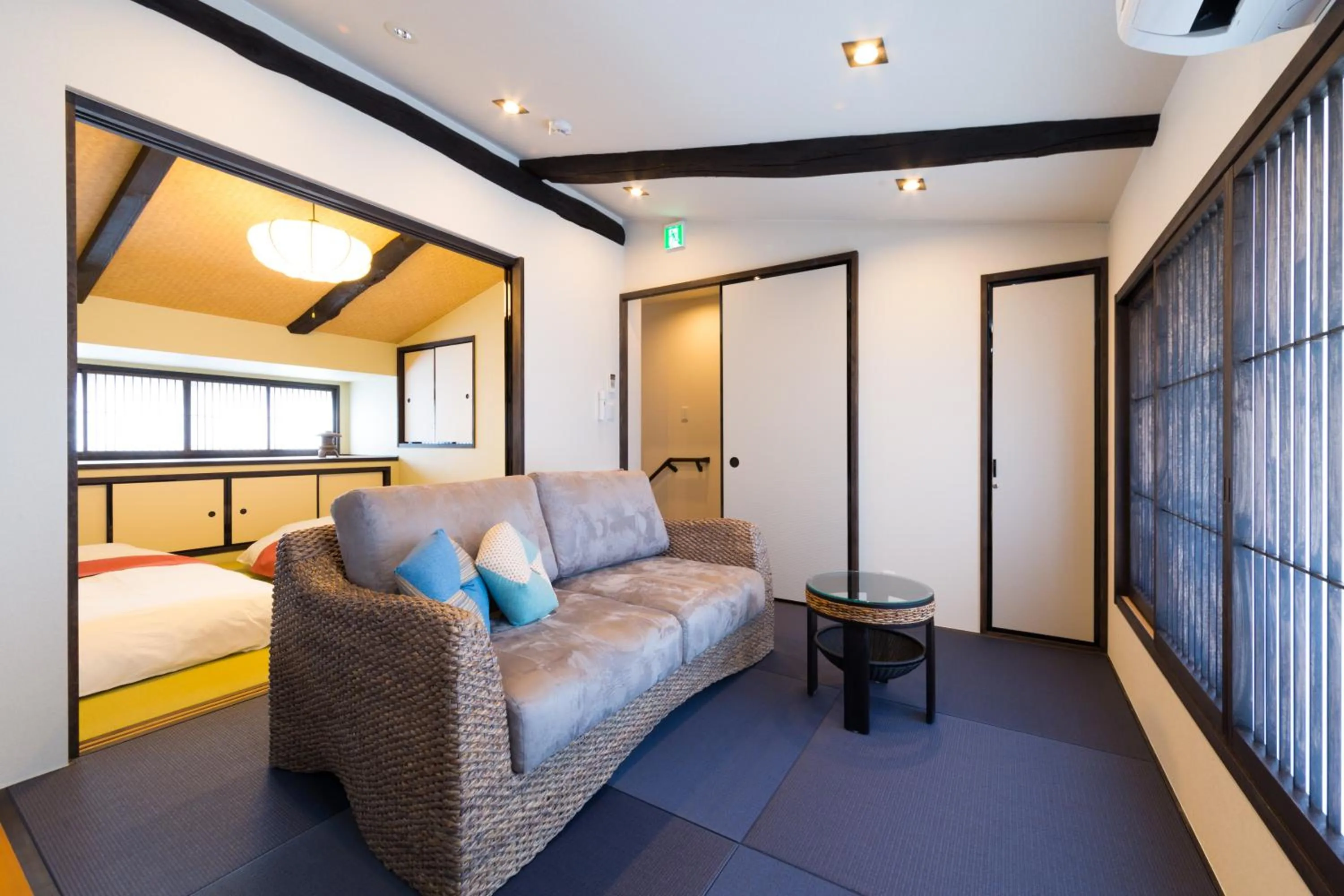 Living room, Bed in 京と家 鴨川五条 -Kyotoya Kamogawagojo-