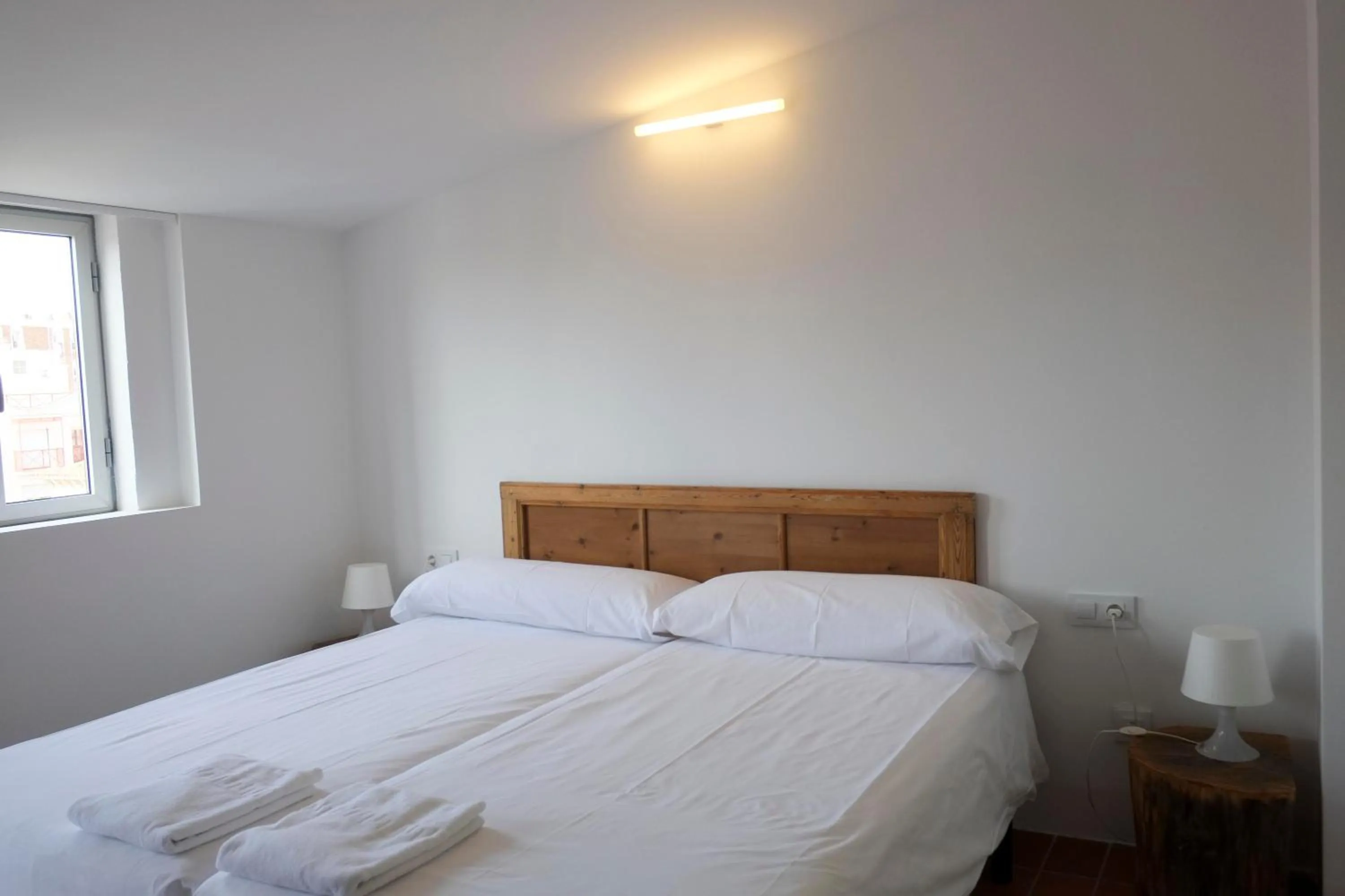 Photo of the whole room, Bed in Pigal