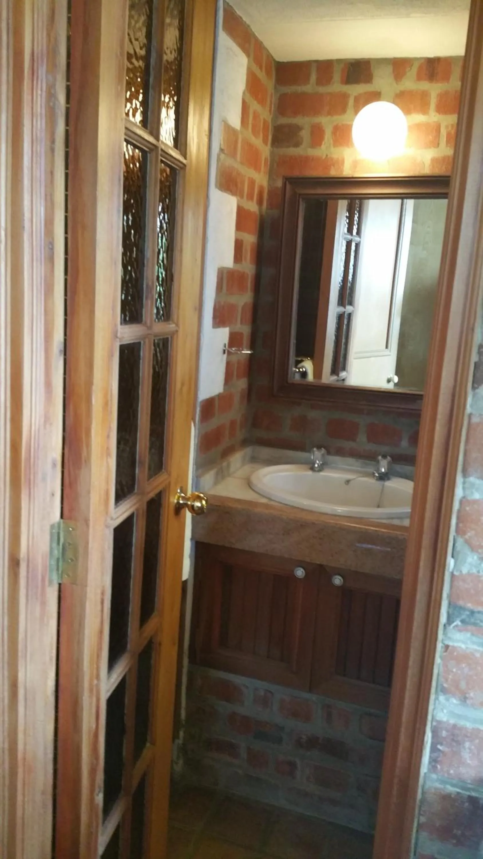 Bathroom in Woodmere Grand Hotel & Serviced Apartments