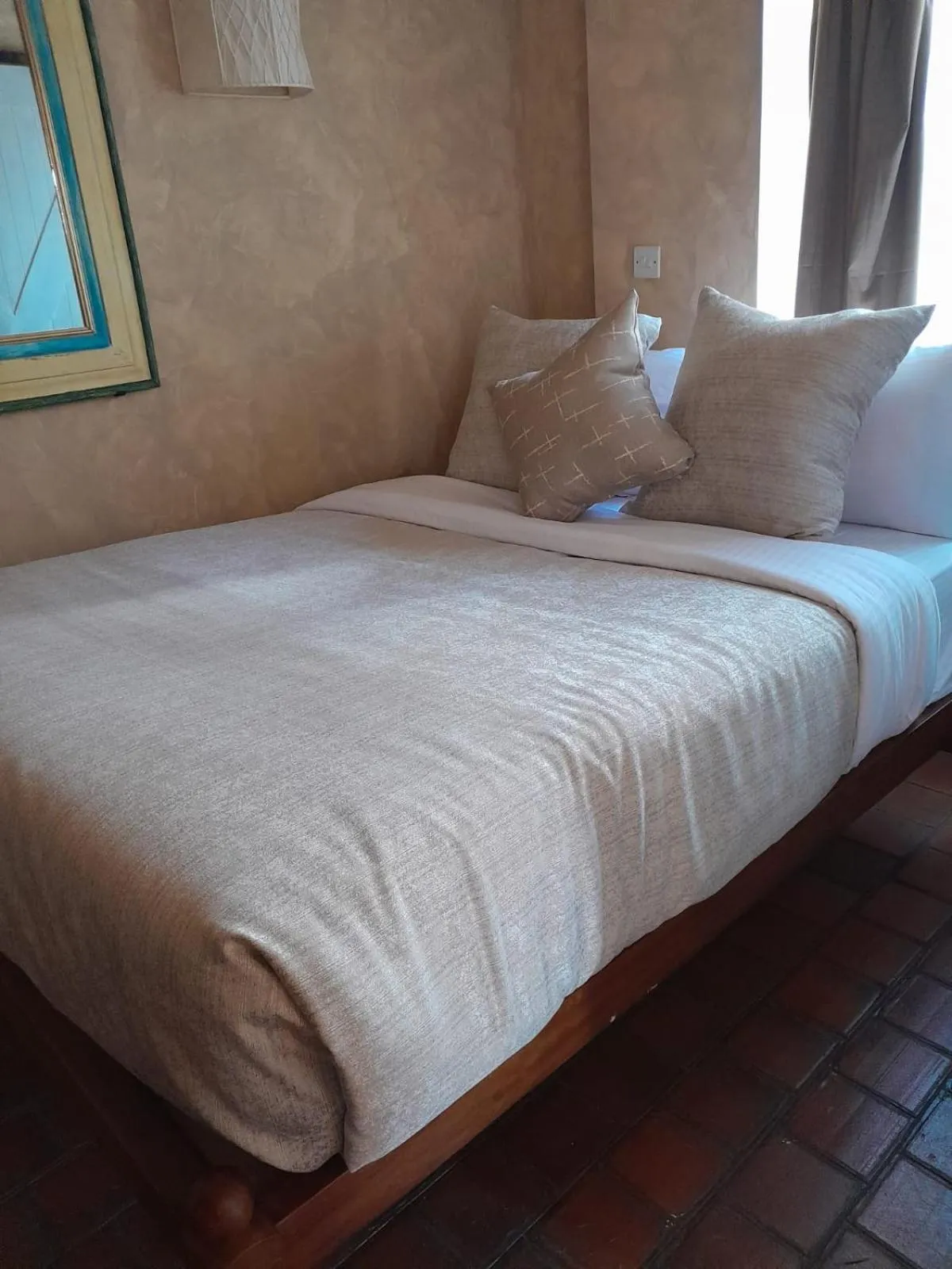 Bed in Woodmere Grand Hotel & Serviced Apartments