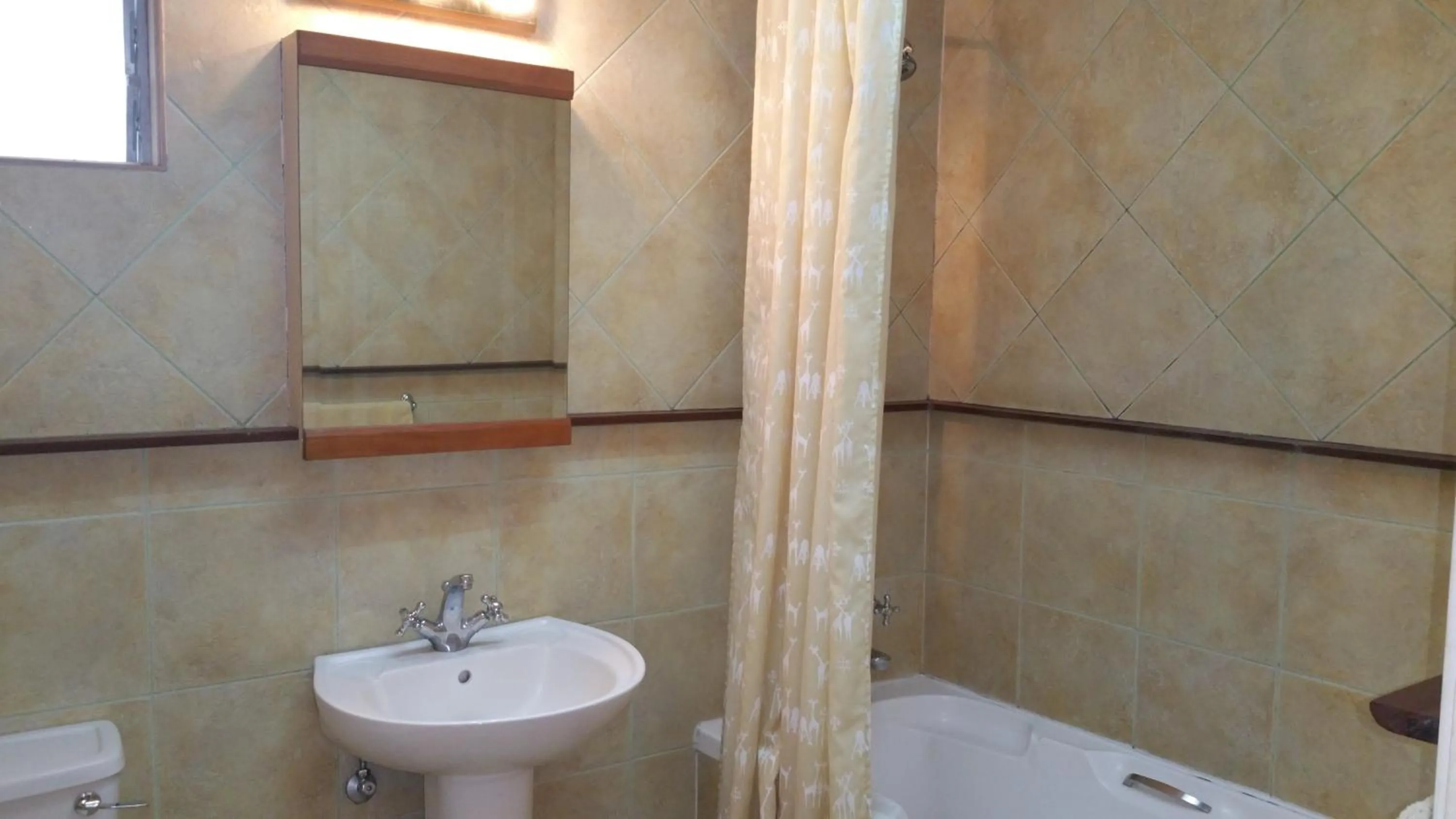 Shower in Woodmere Grand Hotel & Serviced Apartments