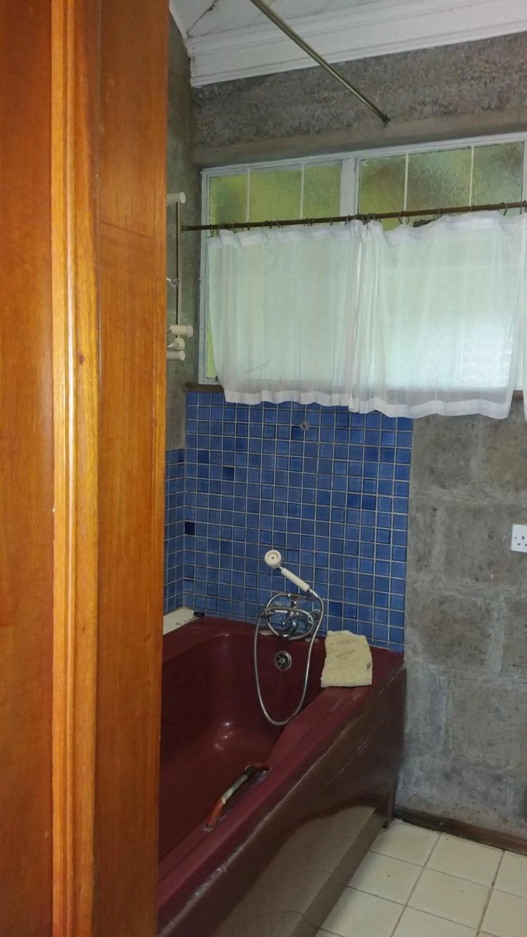 Bathroom in Woodmere Grand Hotel & Serviced Apartments