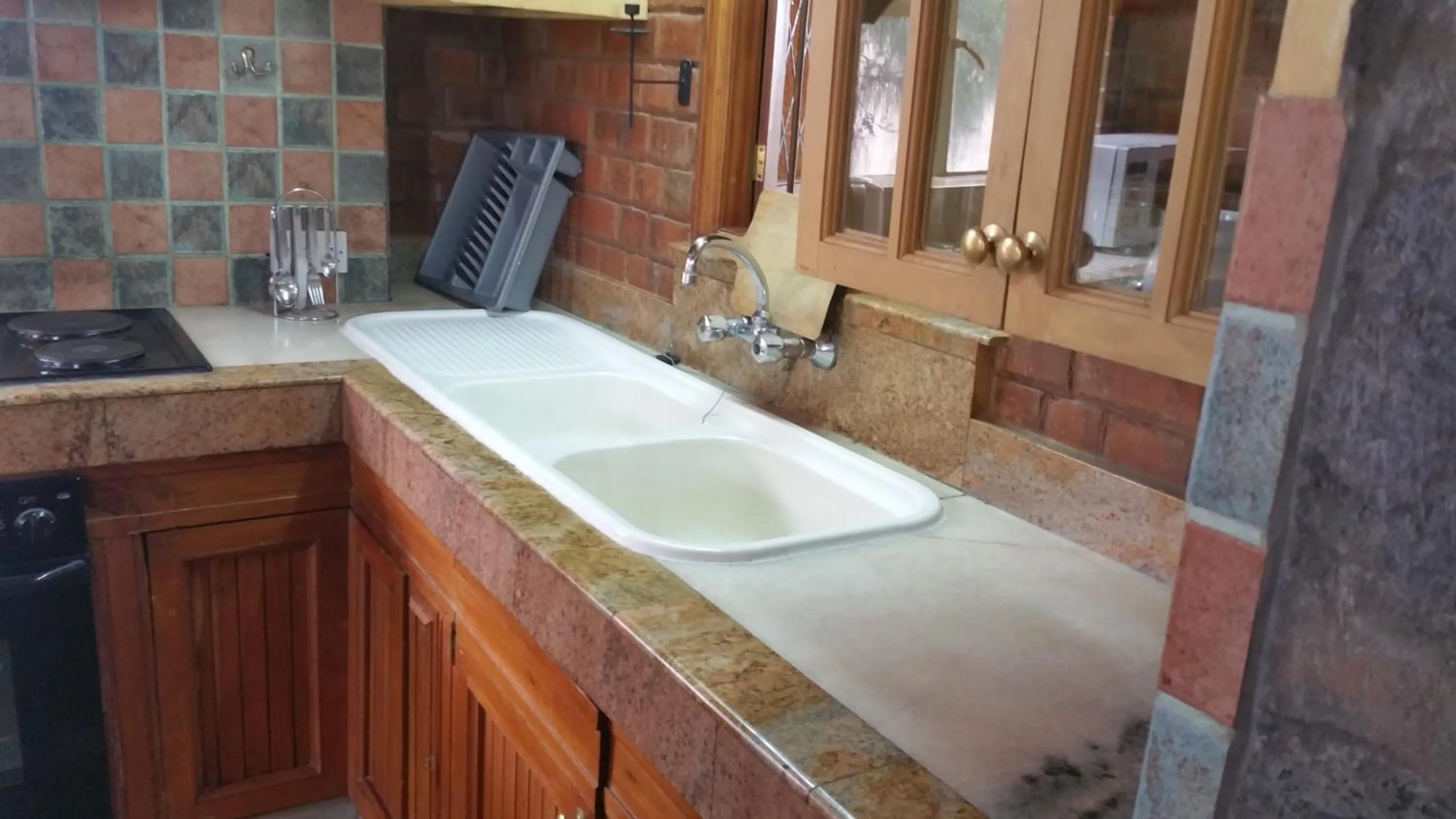 Kitchen or kitchenette in Woodmere Grand Hotel & Serviced Apartments