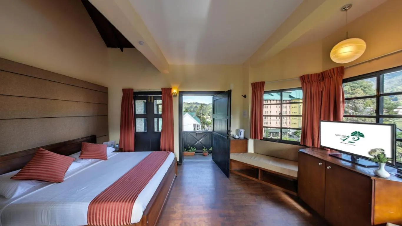 Photo of the whole room, Bed in Cottage 42