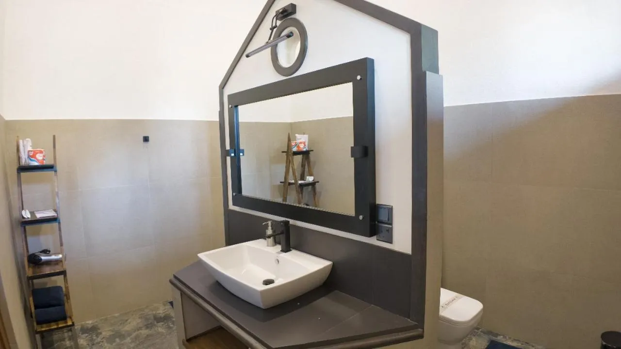 Toilet in Amal Beach Hotel