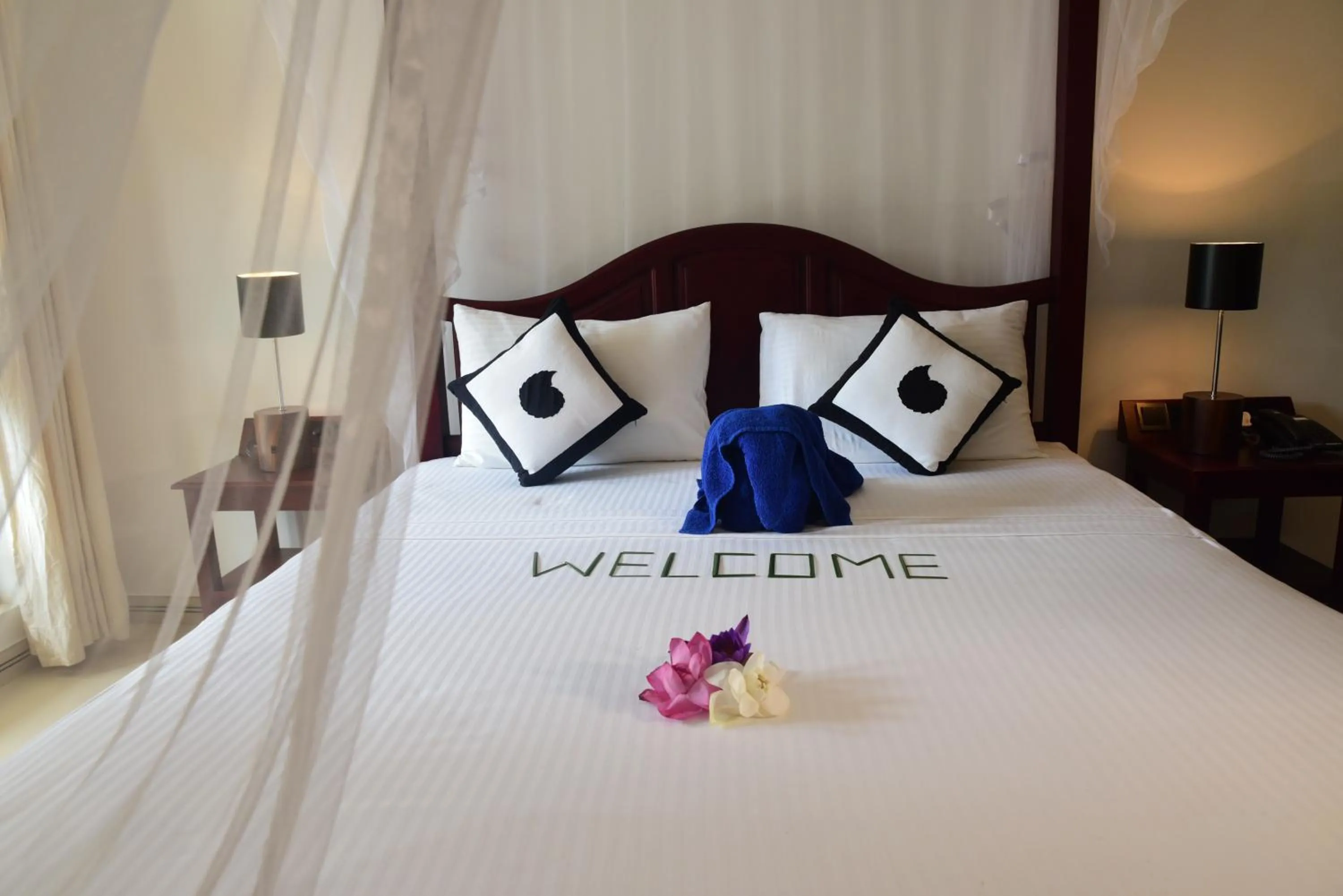 Bed in Amal Beach Hotel