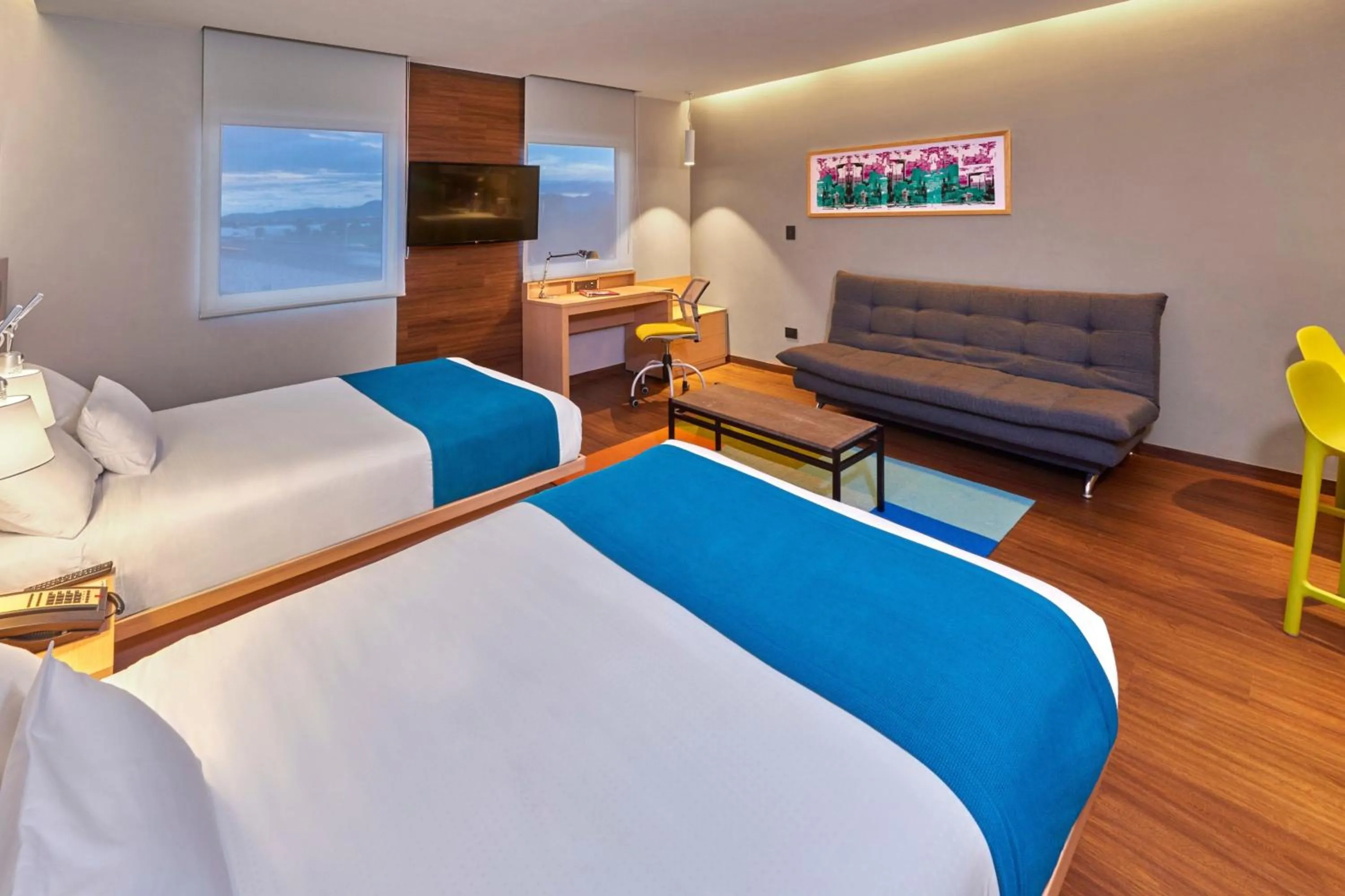 Photo of the whole room, Bed in City Express Suites by Marriott Silao Aeropuerto