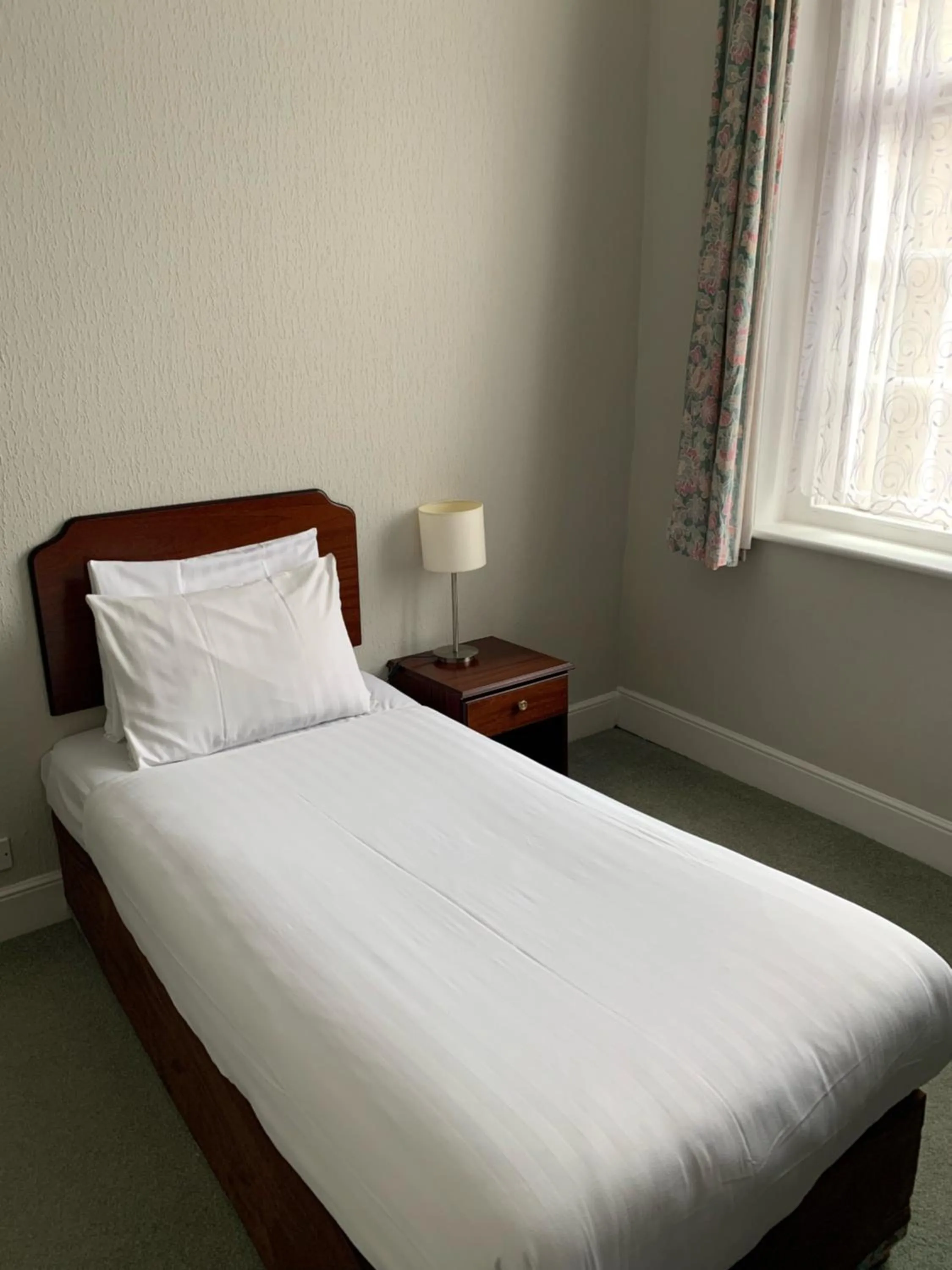 Bed in Royal Esplanade Hotel