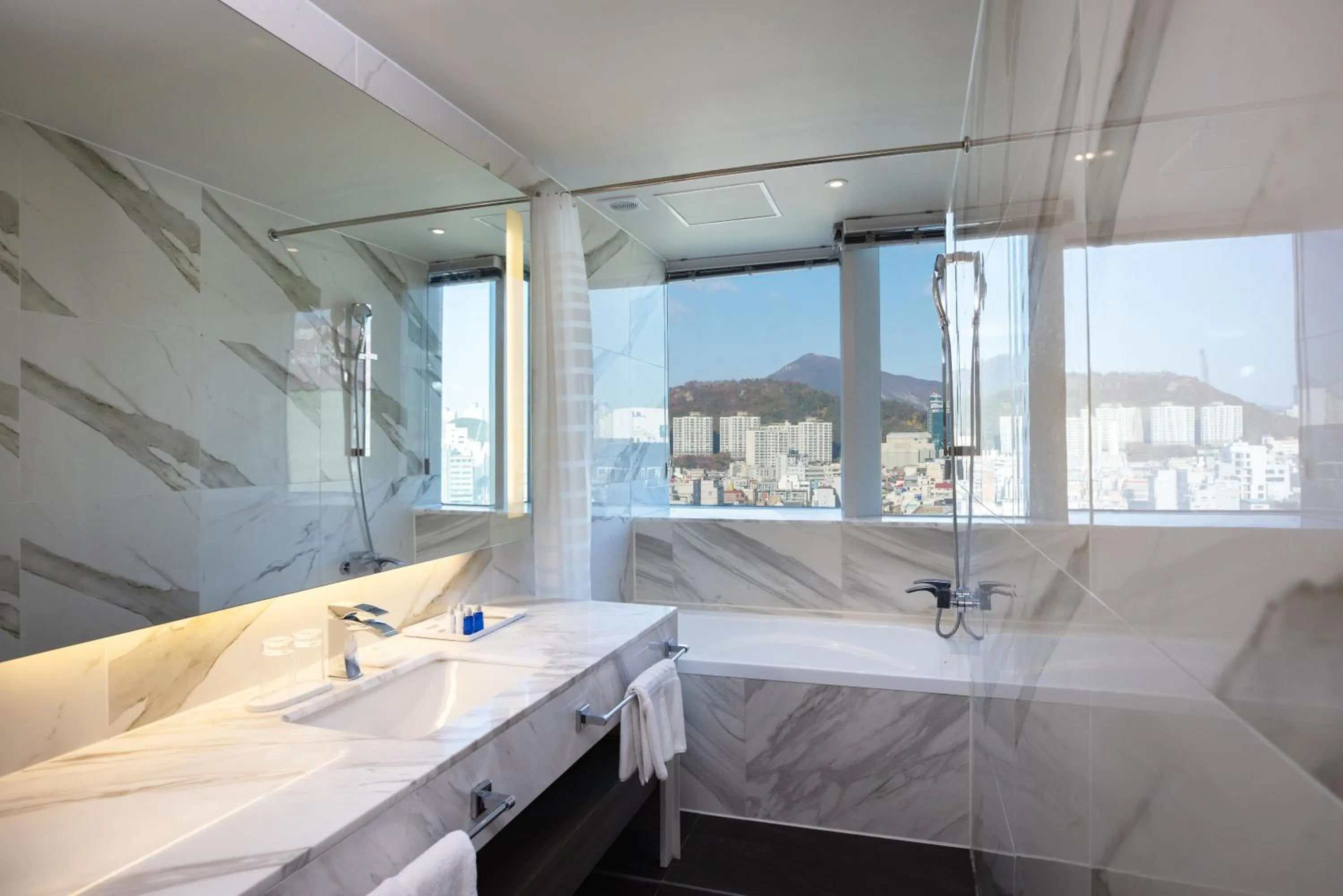 Bathroom in Kent Hotel Gwangalli by Kensington