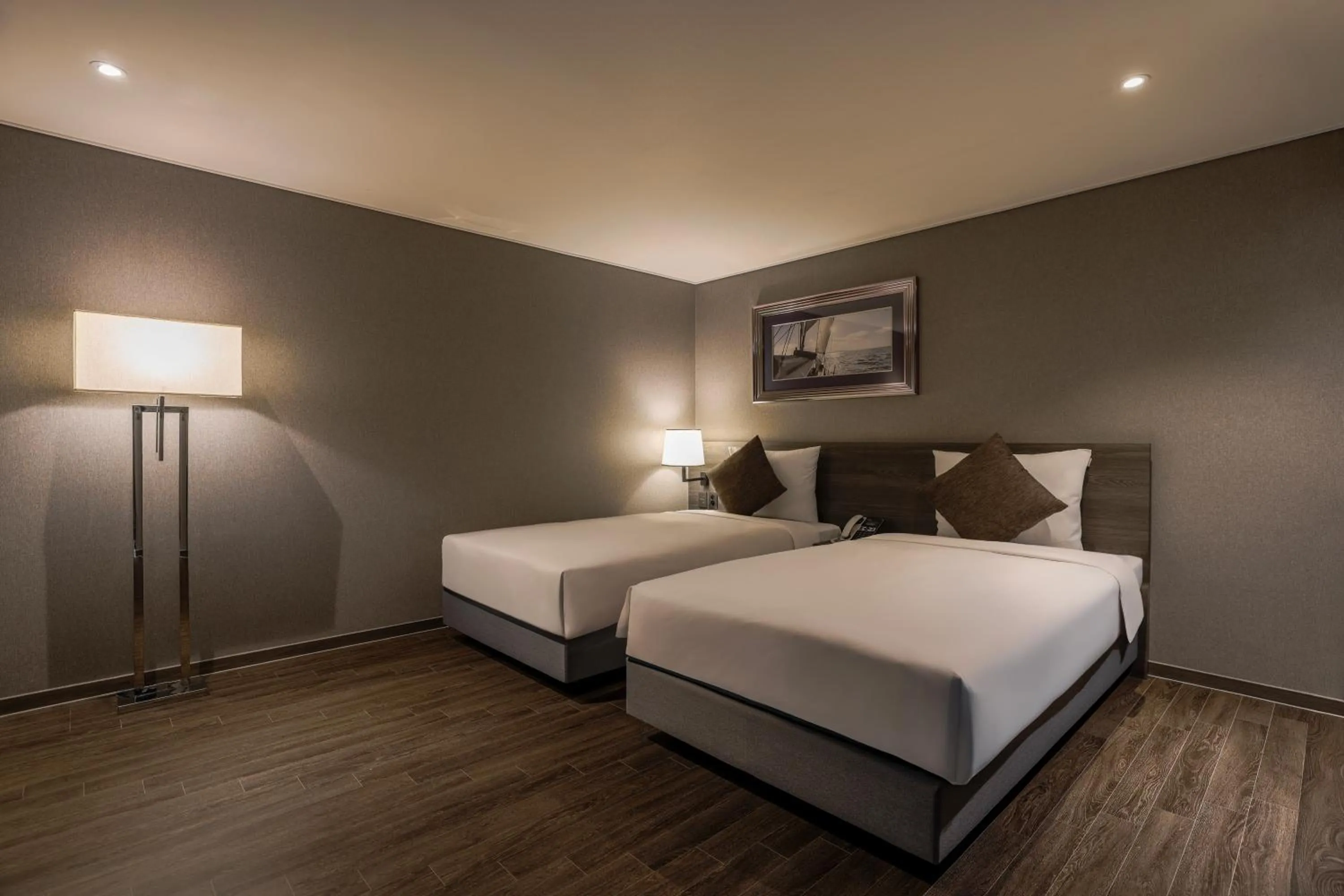 Bed in Kent Hotel Gwangalli by Kensington