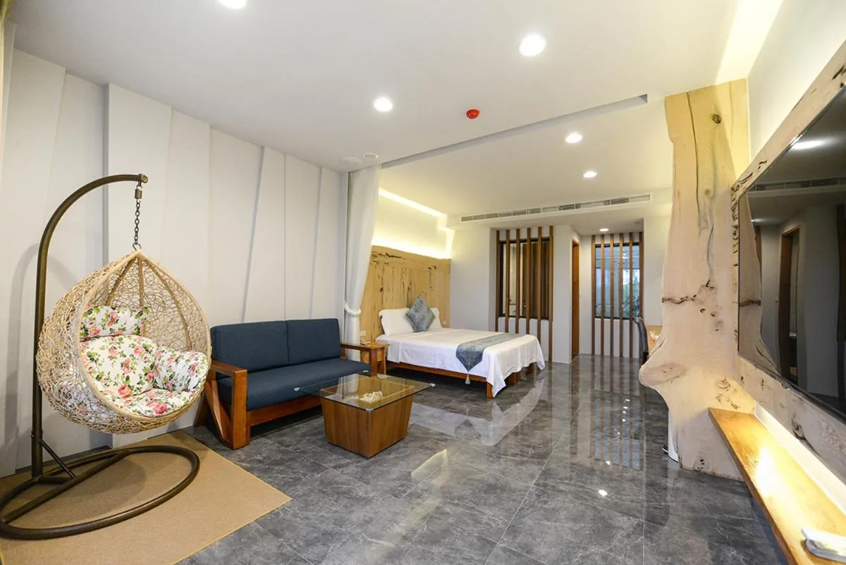 Bed in Oceanic Pearl Resort