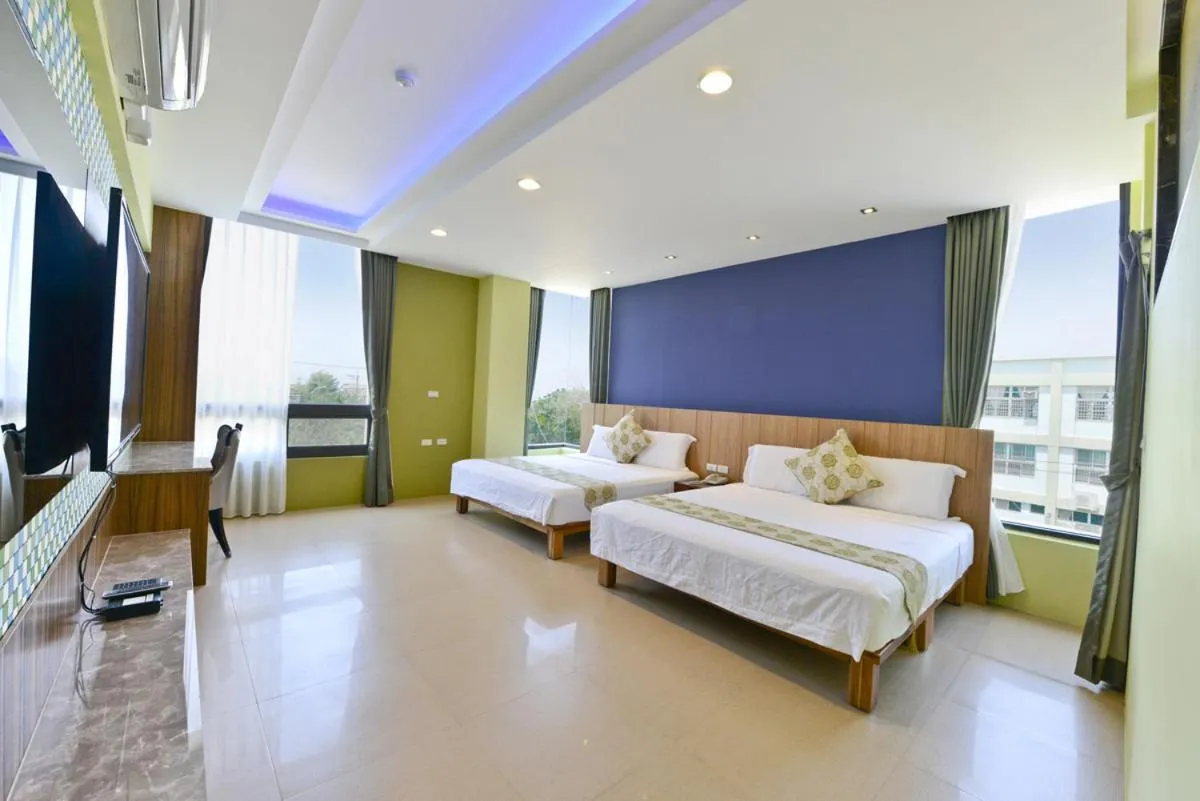 Bed in Oceanic Pearl Resort