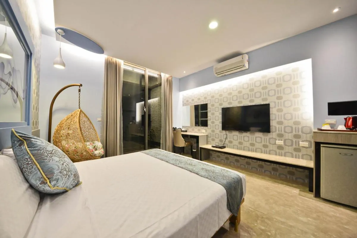 Bed in Oceanic Pearl Resort