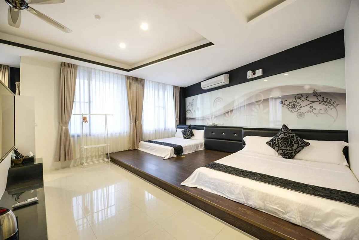 Bed in Oceanic Pearl Resort