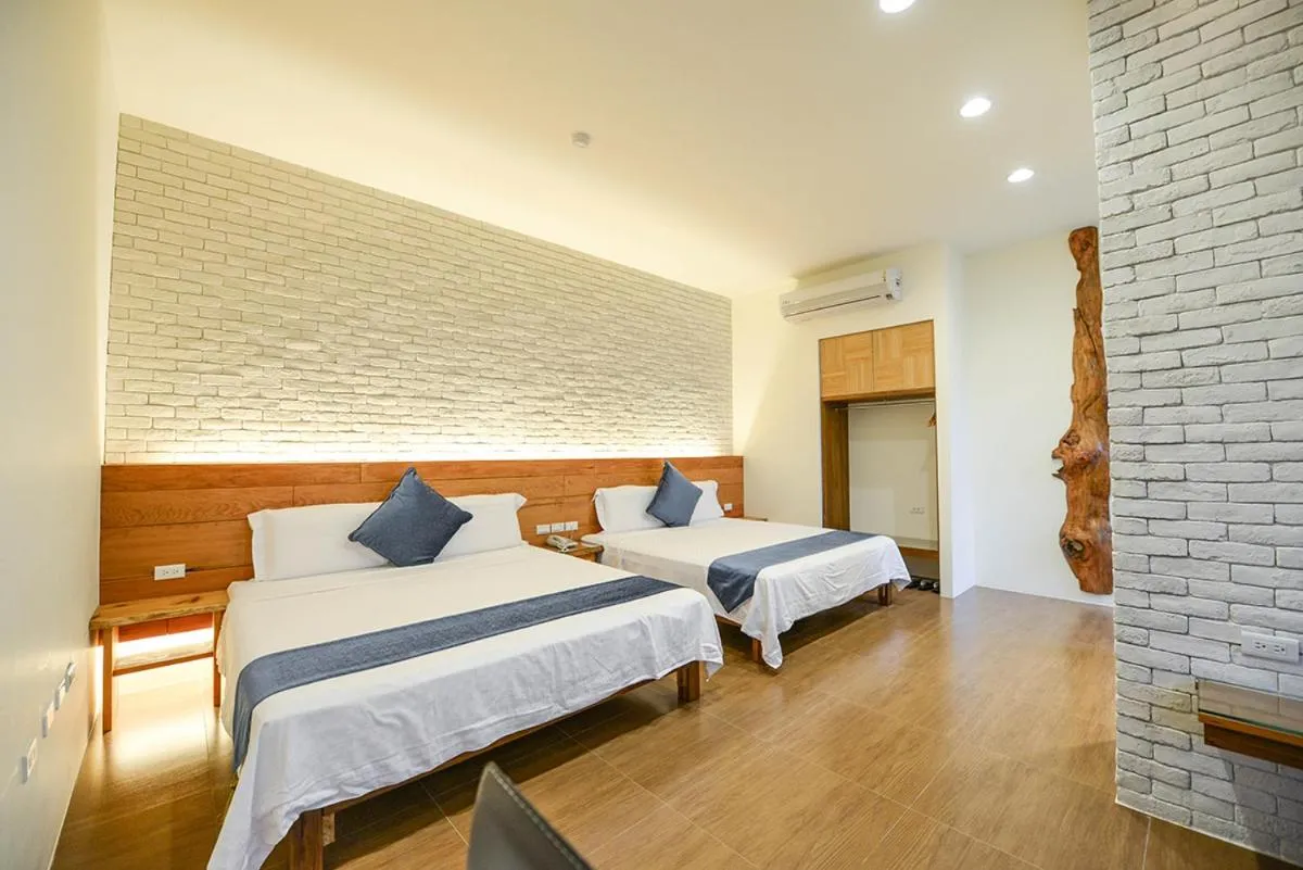 Bed in Oceanic Pearl Resort