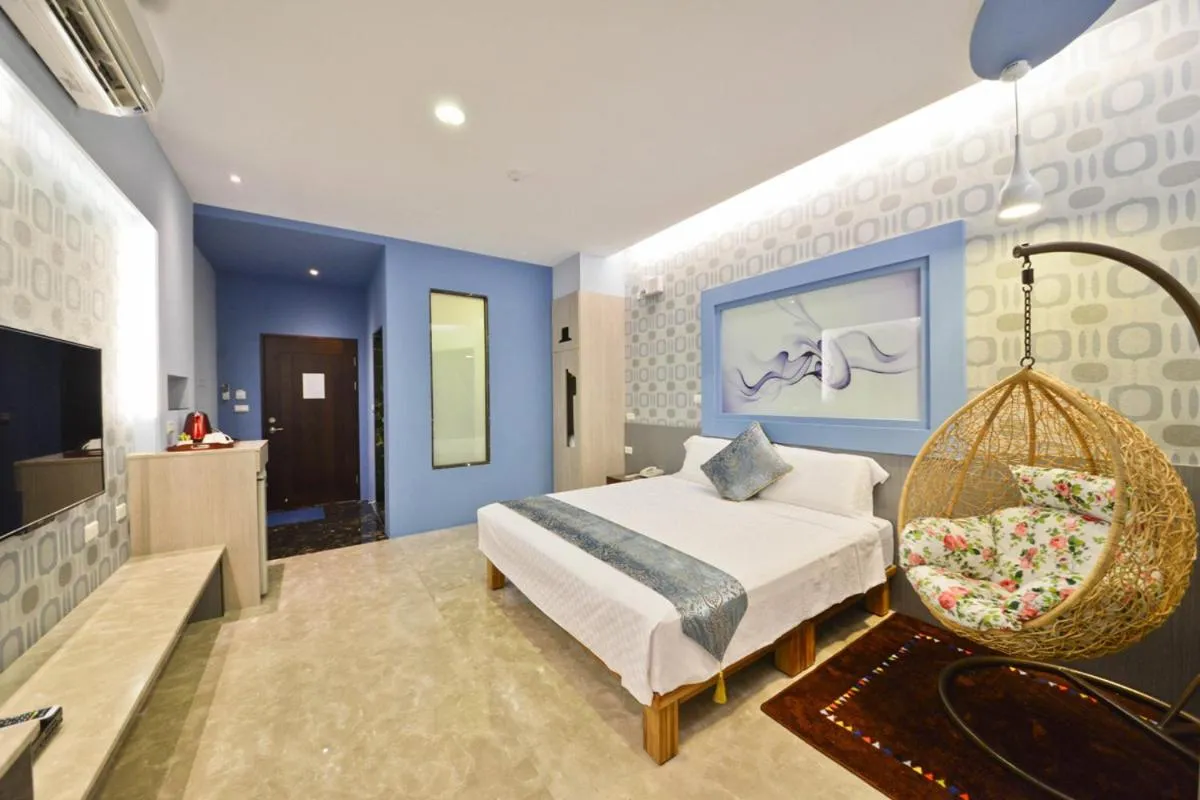 Bed in Oceanic Pearl Resort