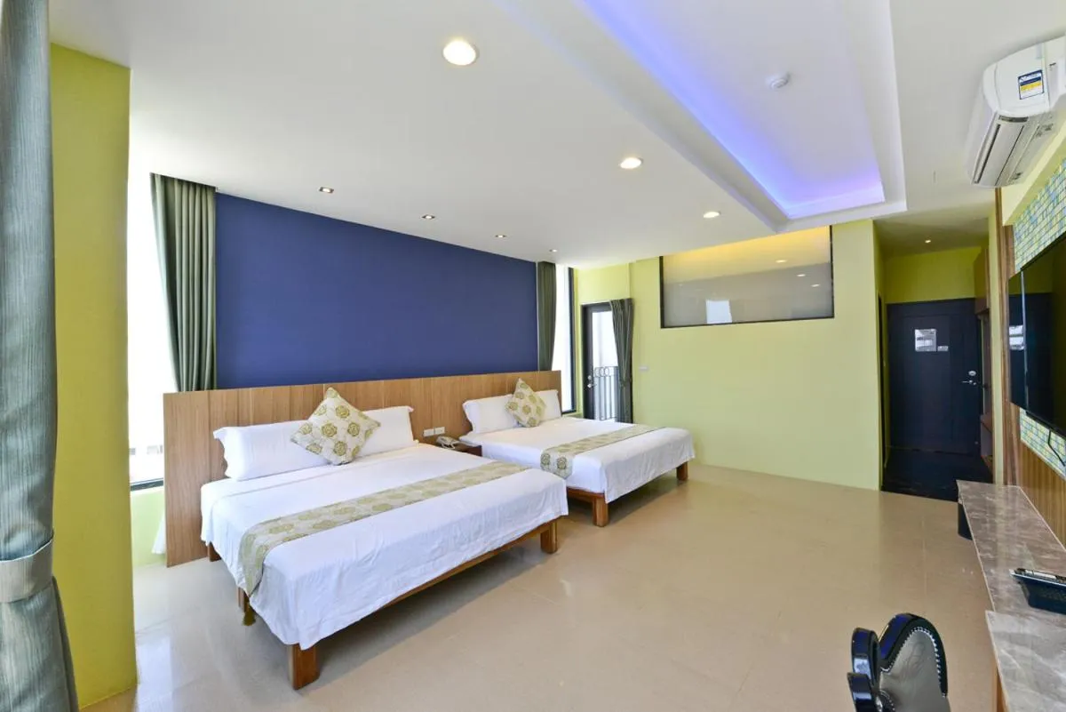 Bed in Oceanic Pearl Resort