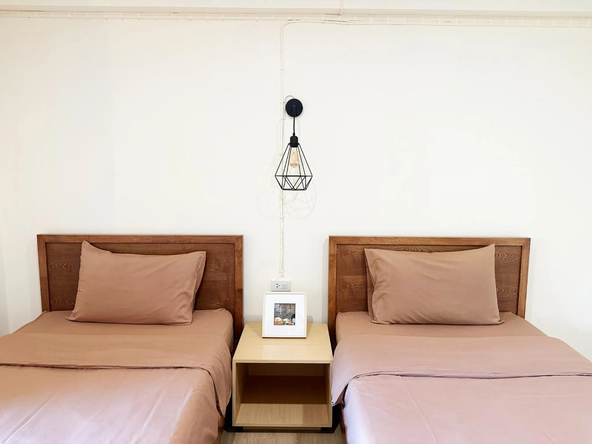 Bed in I-Home Residence and Hotel