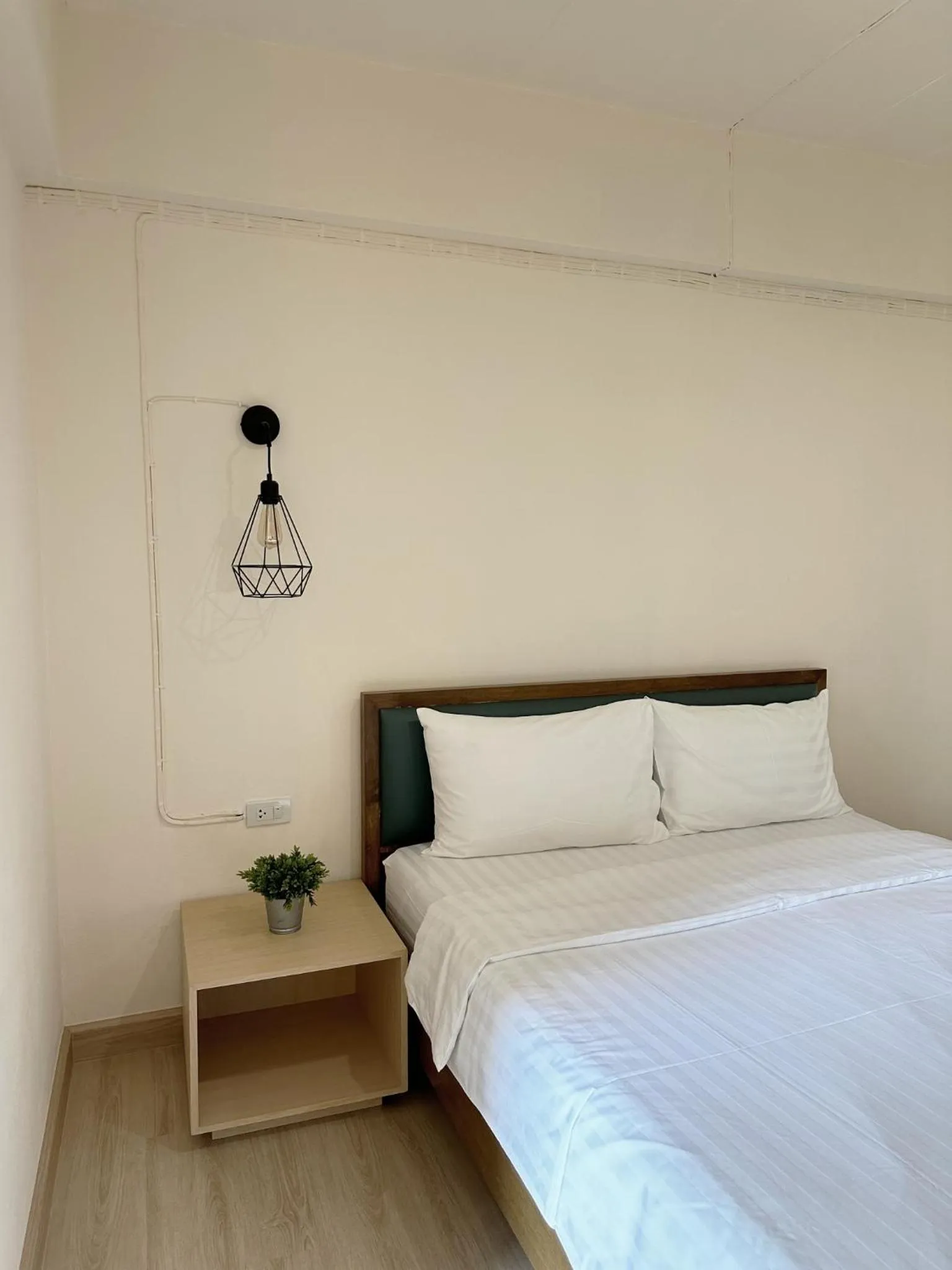 Bed in I-Home Residence and Hotel