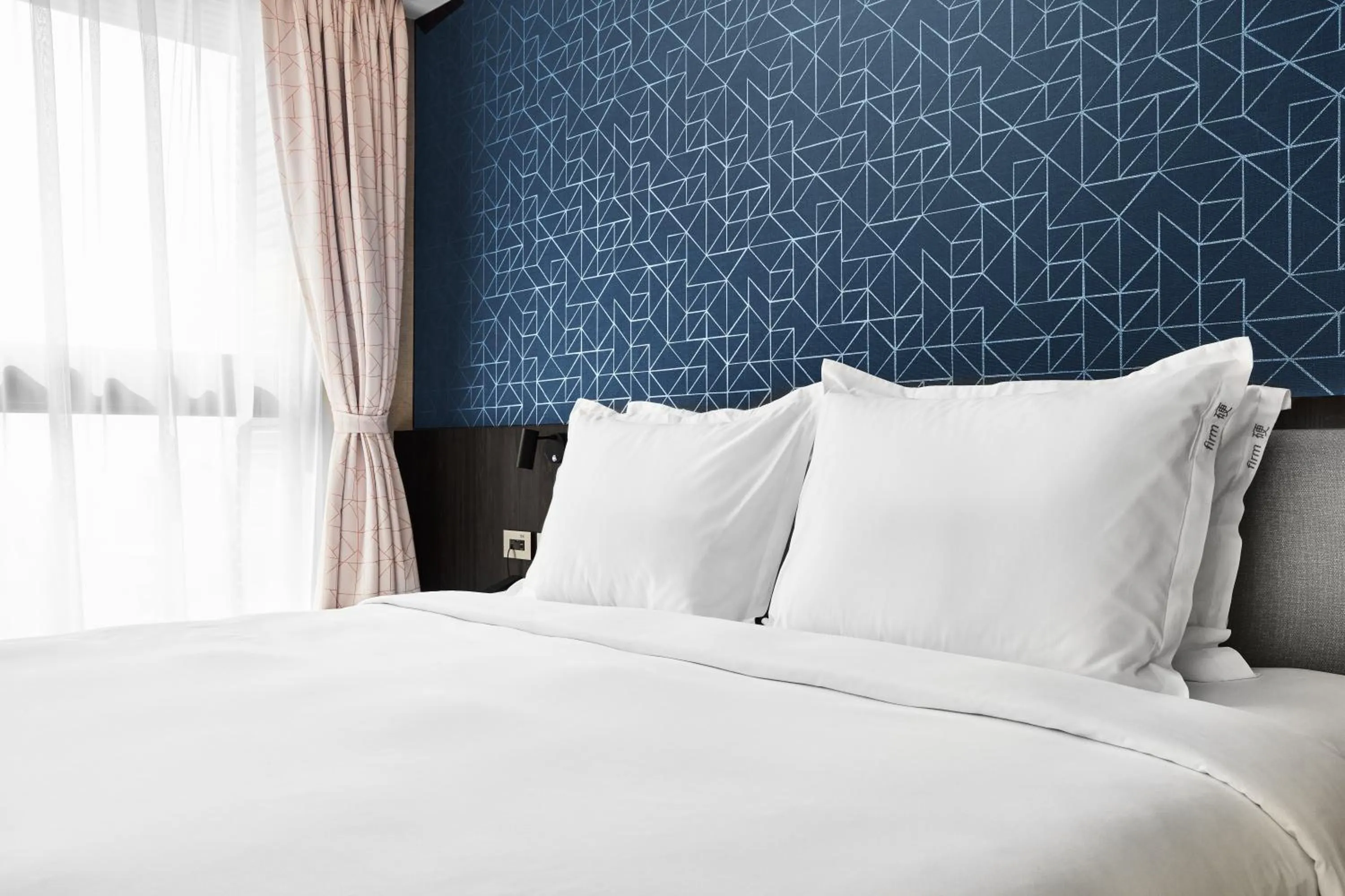 Photo of the whole room, Bed in Holiday Inn Express Kaohsiung Love River by IHG