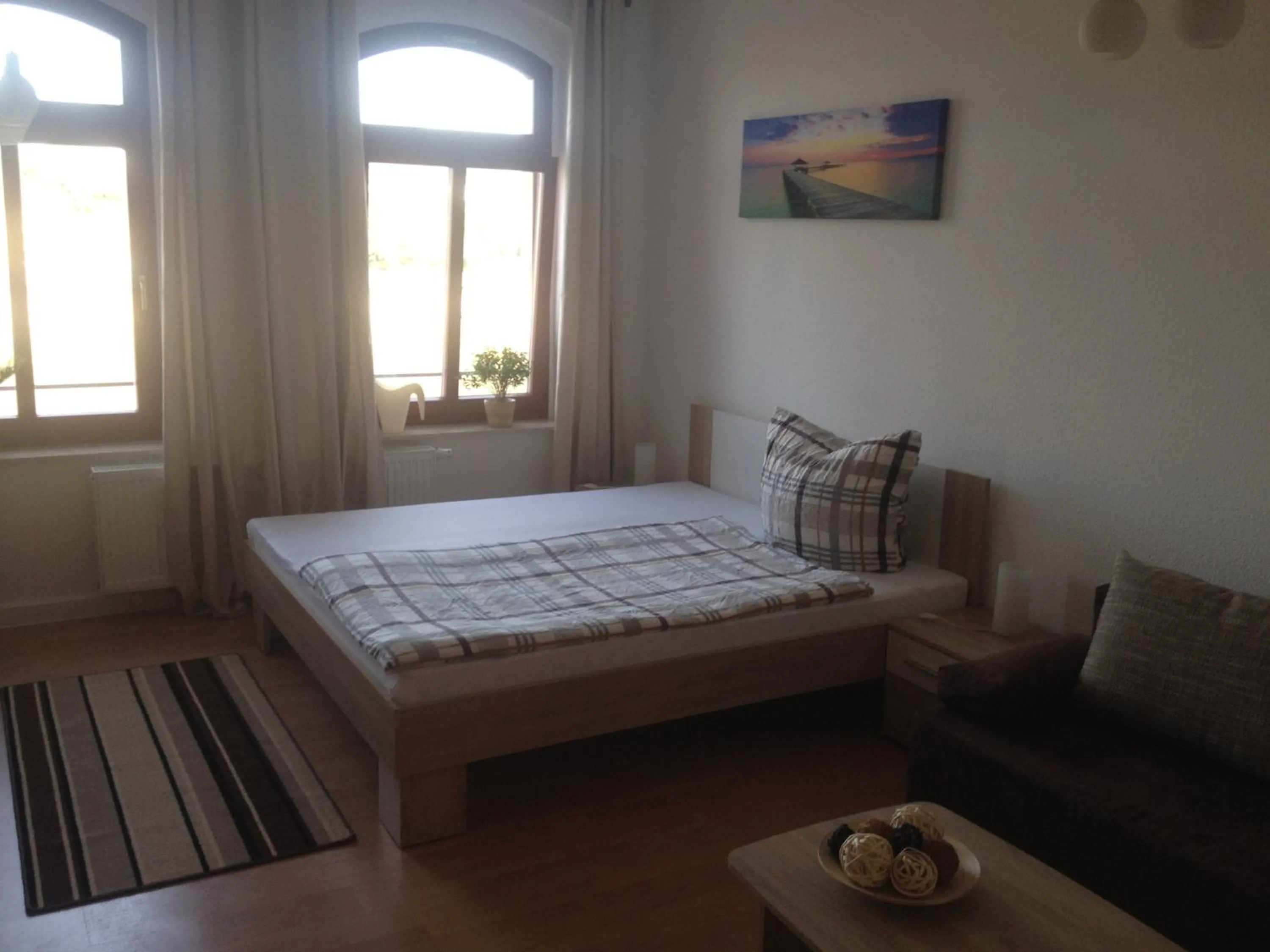 Living room, Bed in Apartment Naumann