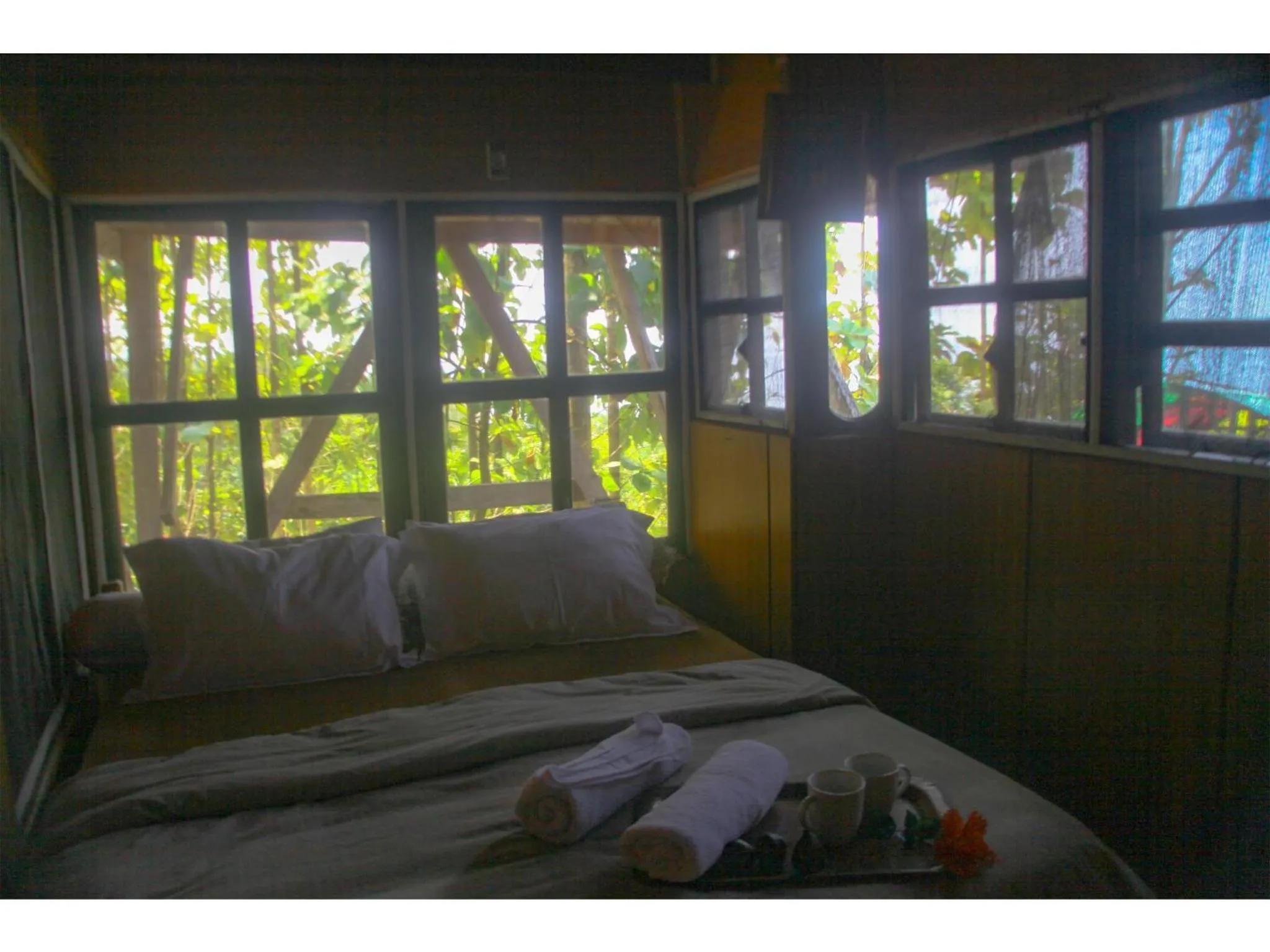 Bed in Karang Aji Beach Villa