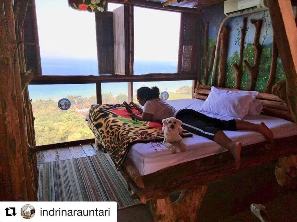 Bed in Karang Aji Beach Villa