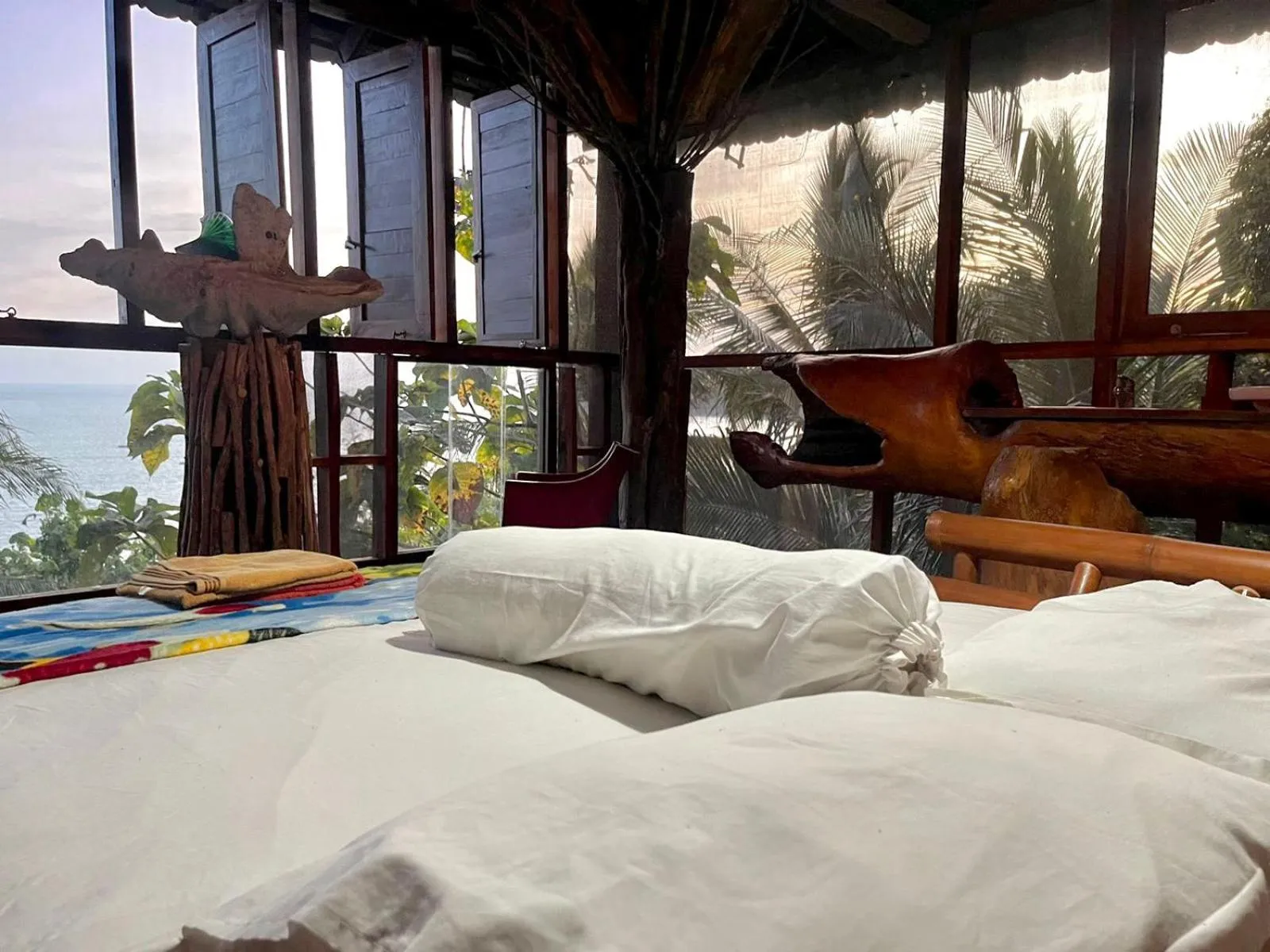 Bed in Karang Aji Beach Villa