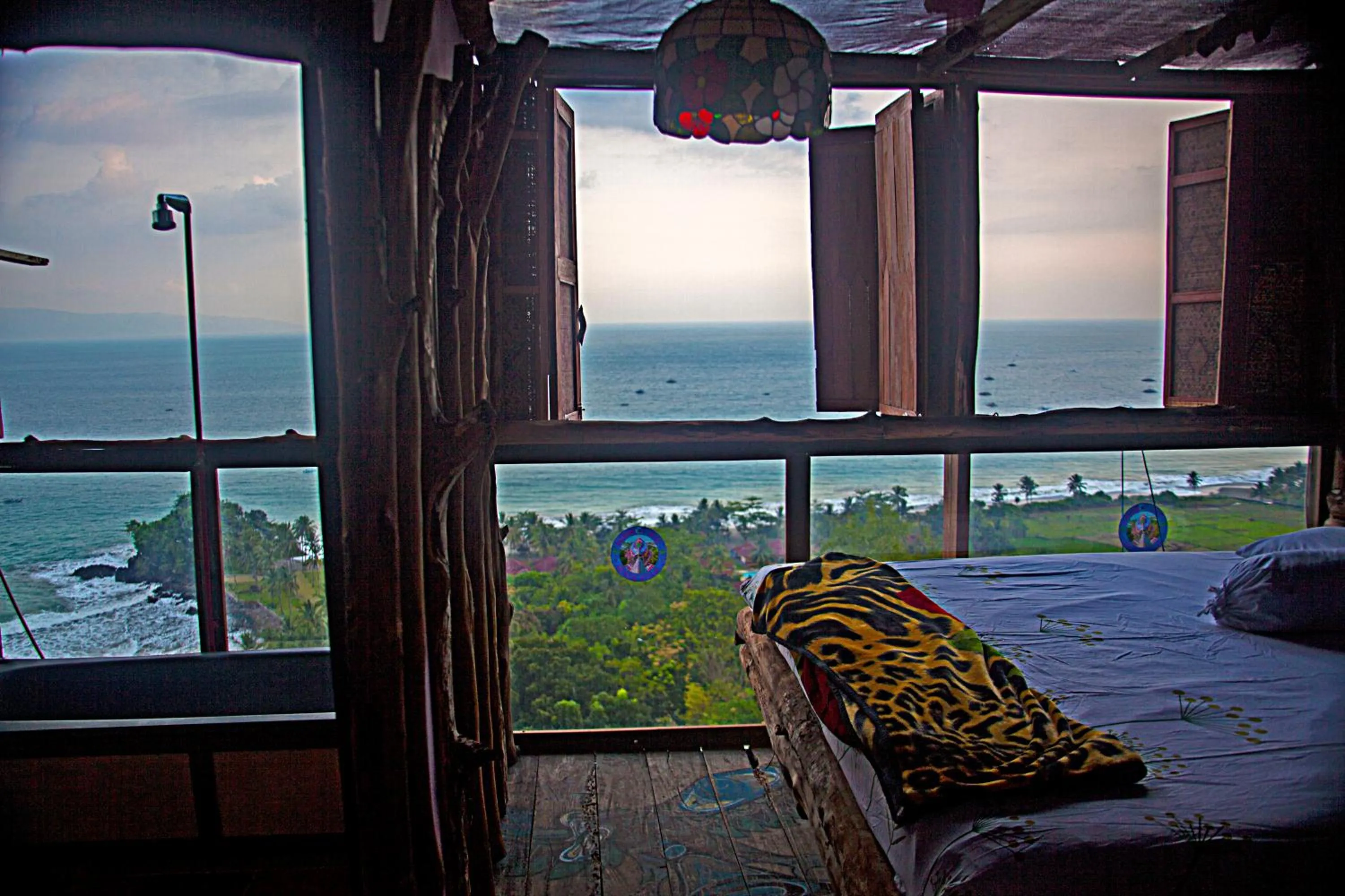 Bed in Karang Aji Beach Villa