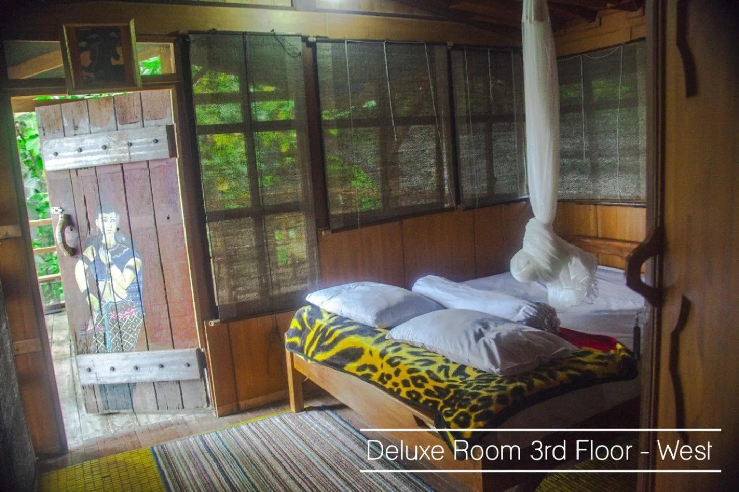 Bed in Karang Aji Beach Villa