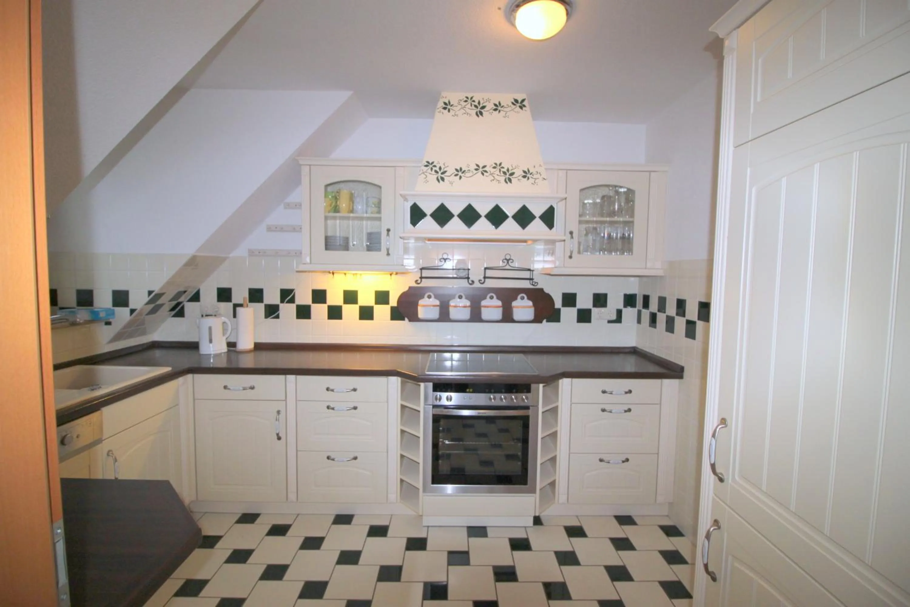 Kitchen or kitchenette in Feriendomizil am Hafen