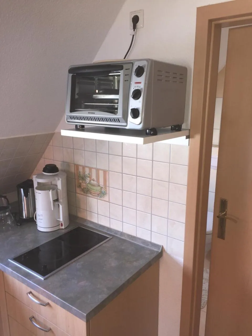 Kitchen or kitchenette in Feriendomizil am Hafen