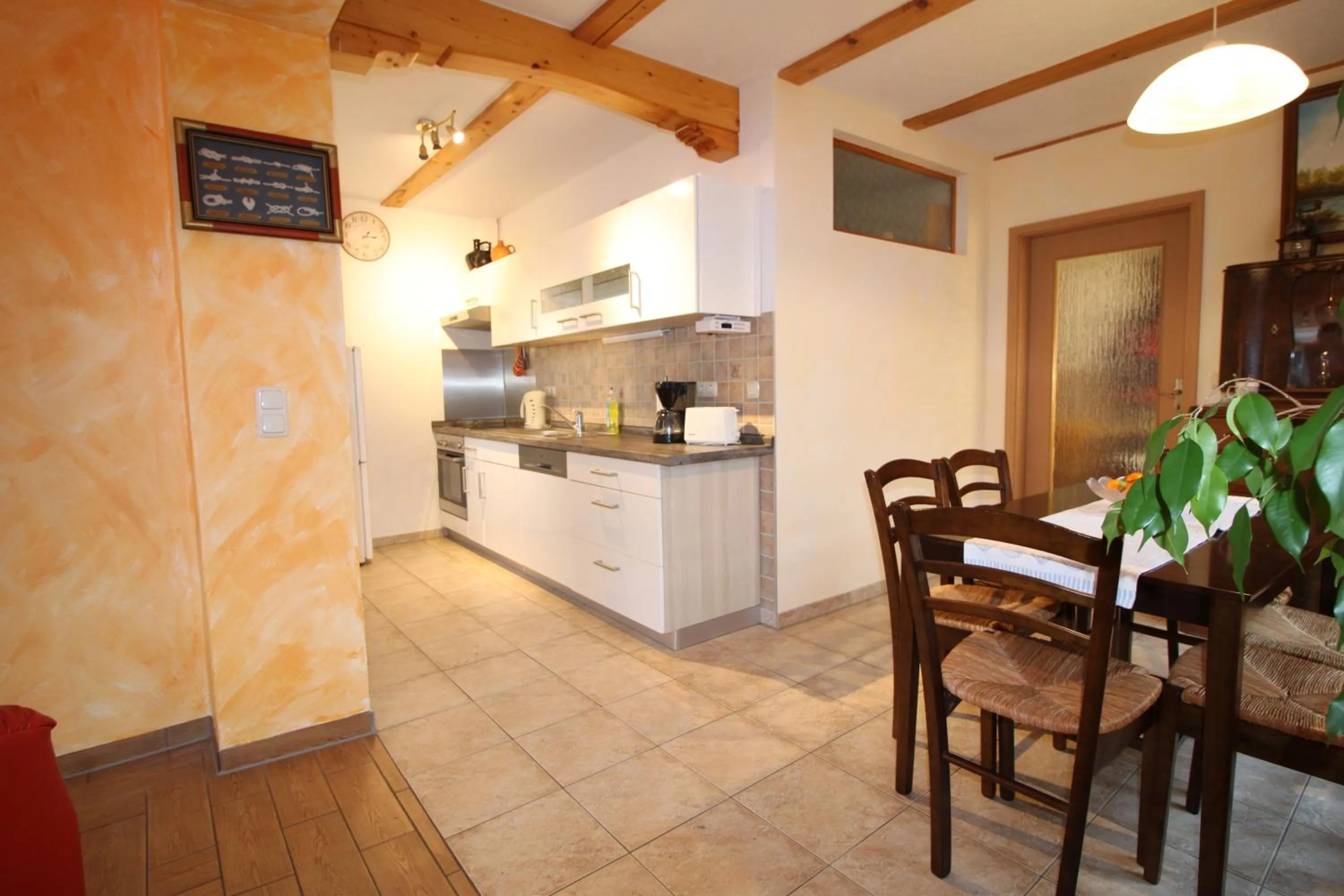 Kitchen or kitchenette in Feriendomizil am Hafen